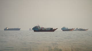Vessels at the Strait of Hormuz, as seen from Musandam, Oman, on 23 September