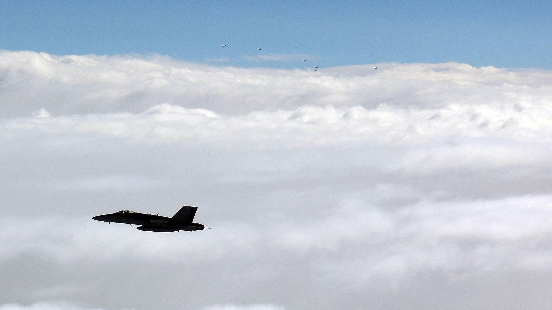 The group of Russian warplanes could be seen in the distance