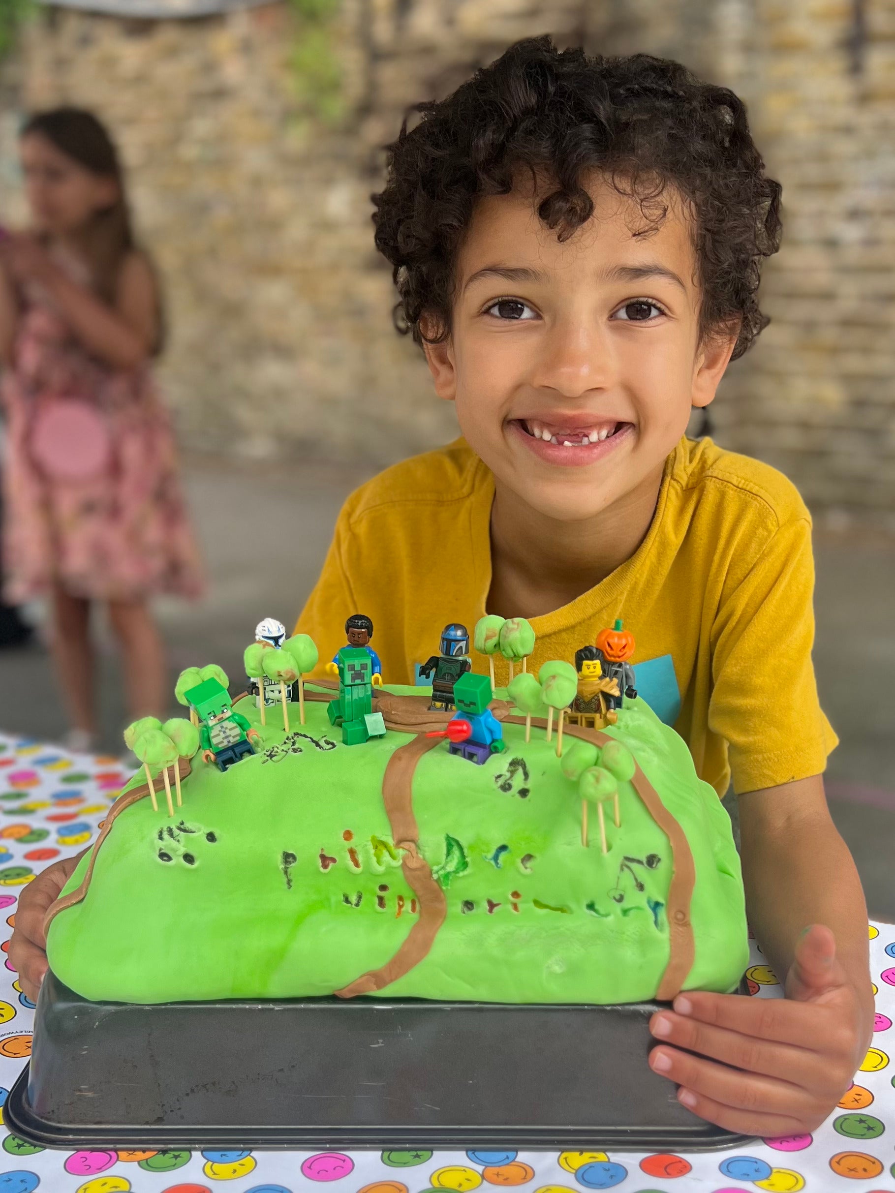Neo after winning his school bake-off with a cake he designed to represent Primrose Hill in London (Skye von der Osten)