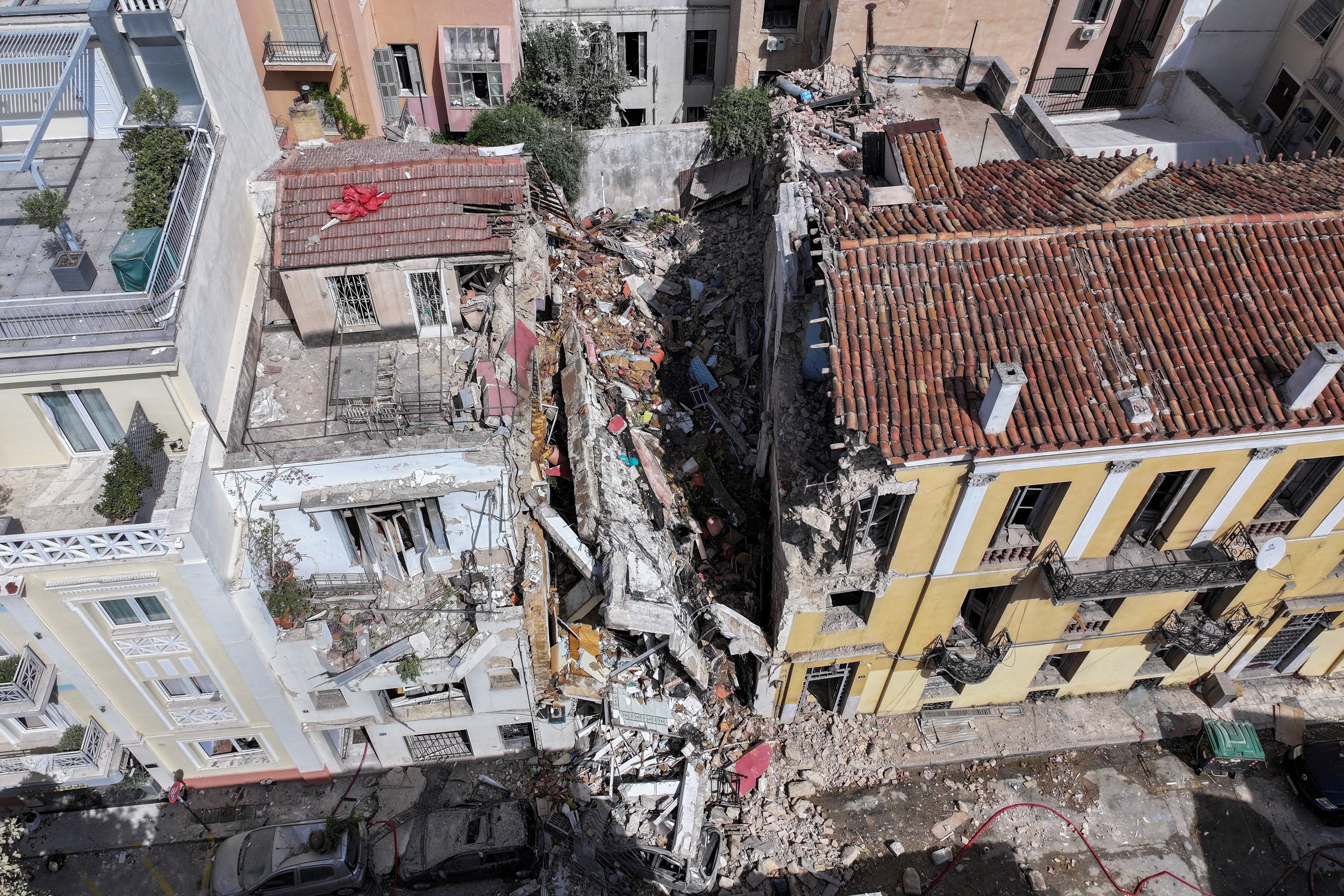 A drone view shows an old building, partially collapsed following an explosion, in the Plaka area, which is popular with tourists, in central Athens, Greece