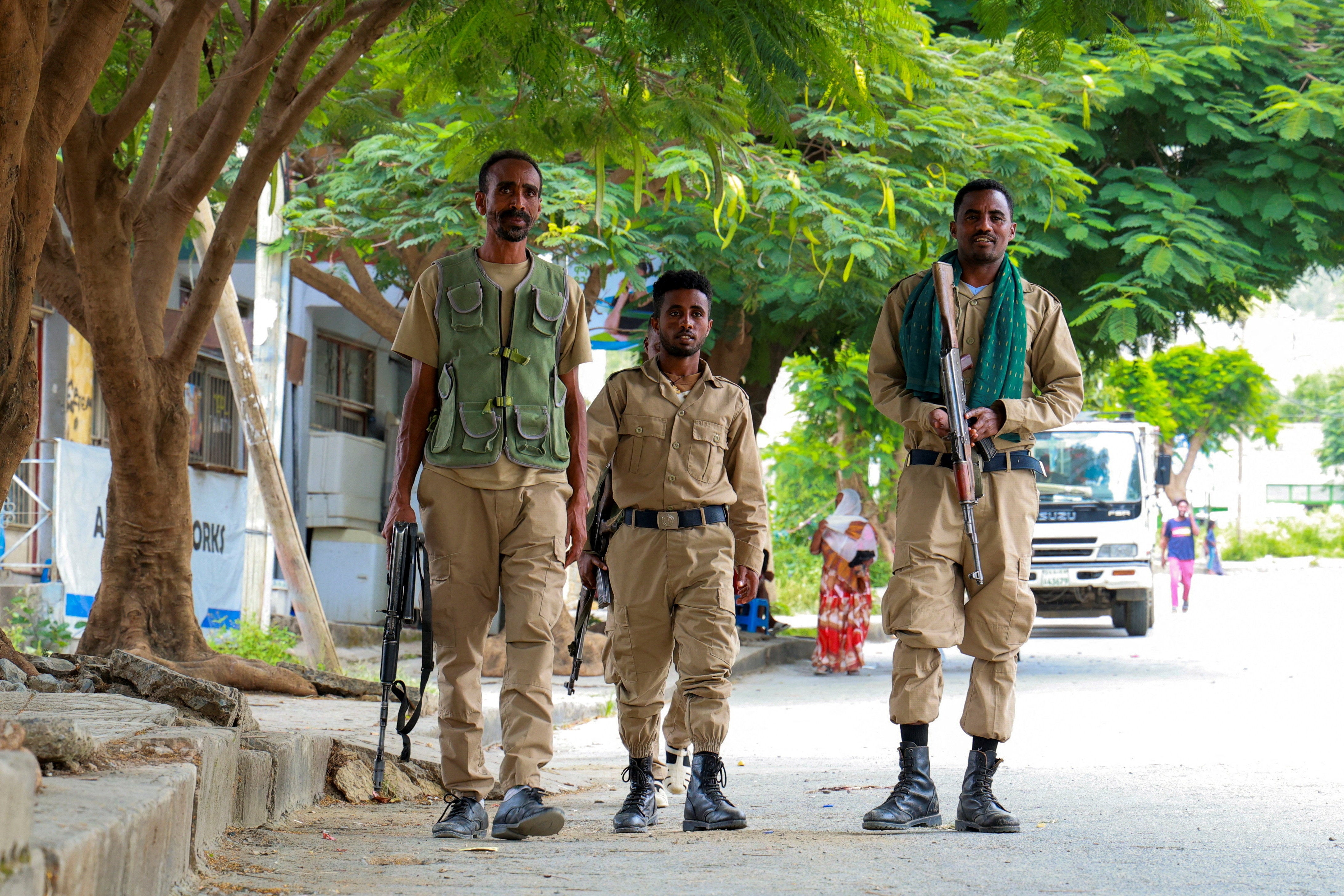 Members of the Tigrayan forces patrol along a street