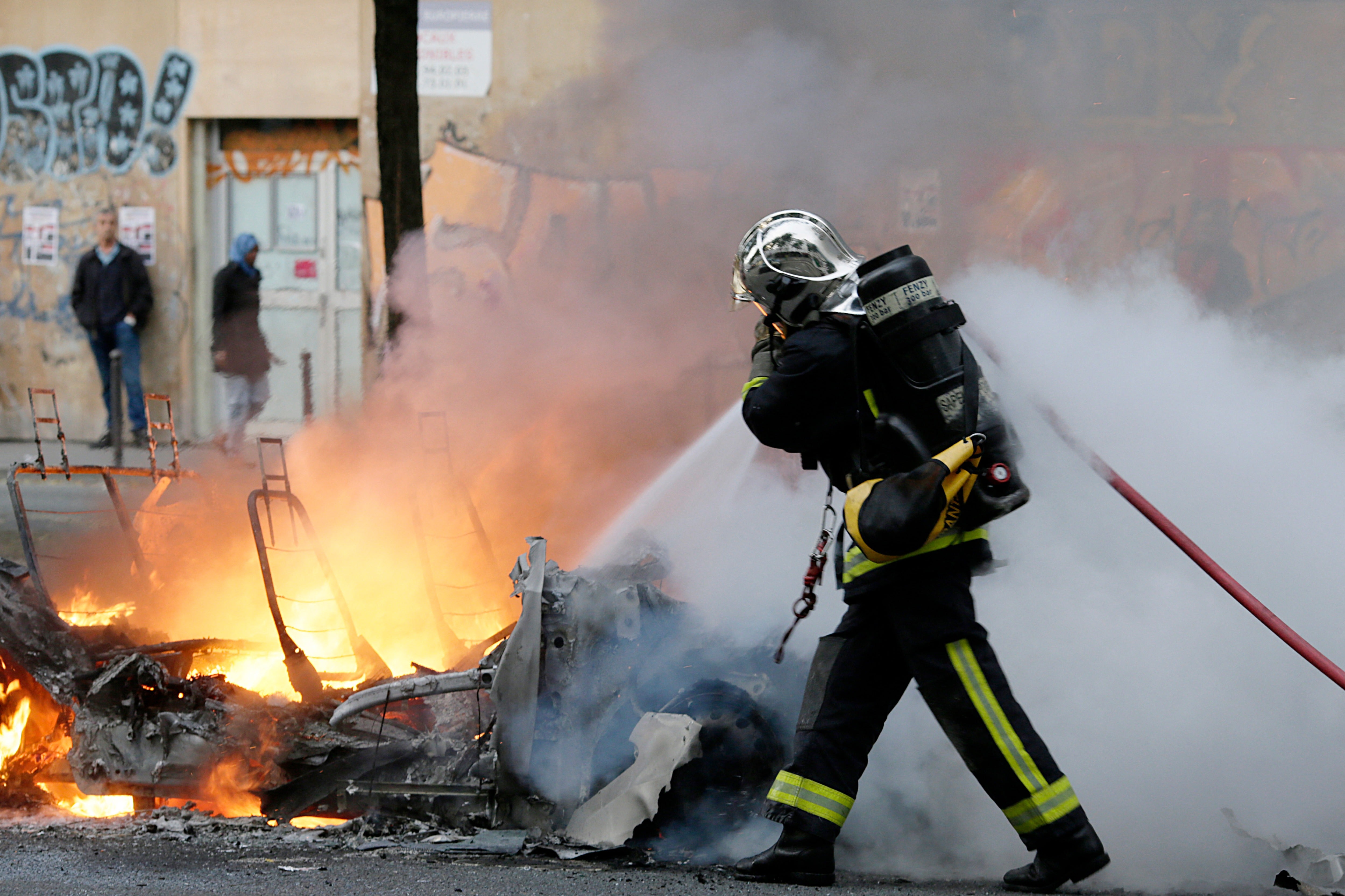 Electric vehicle fires burn hotter and longer than those involving gas-powered cars, according to experts (AFP via Getty Images)