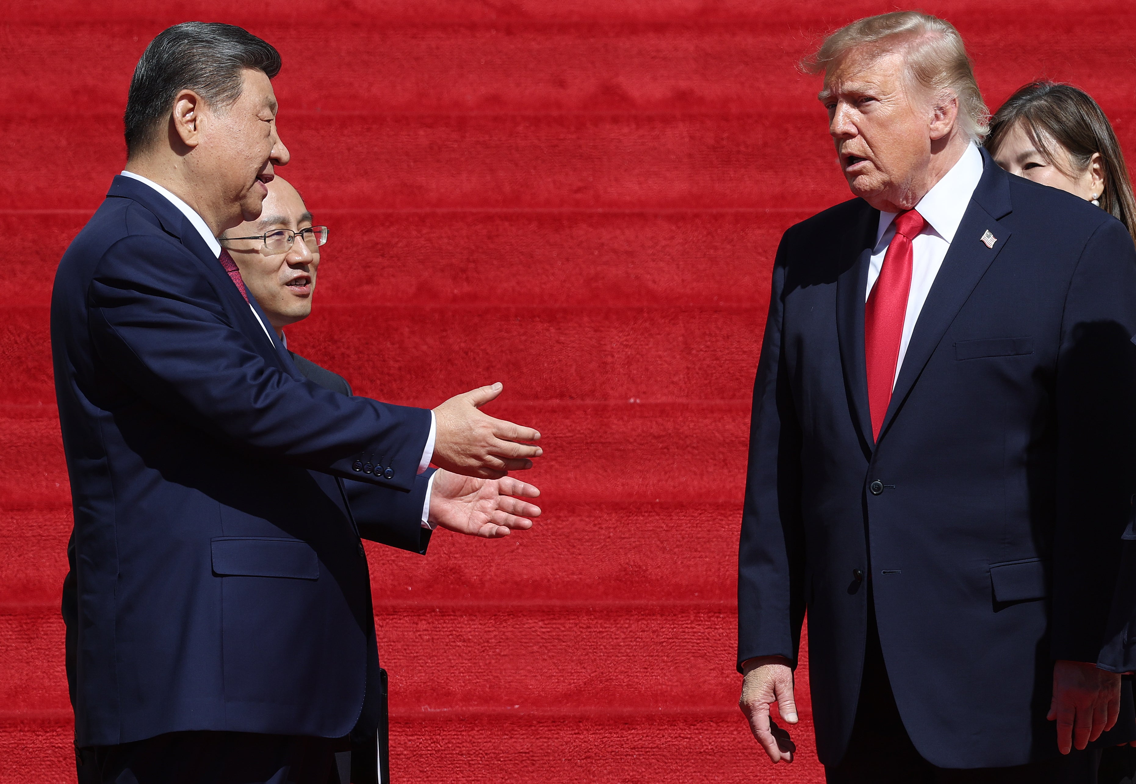 President Donald Trump (R) and President of China Xi Jinping (L) speak as they depart following a tour of the National Archives Museum on September 25, 2026 in Washington, DC (Getty)