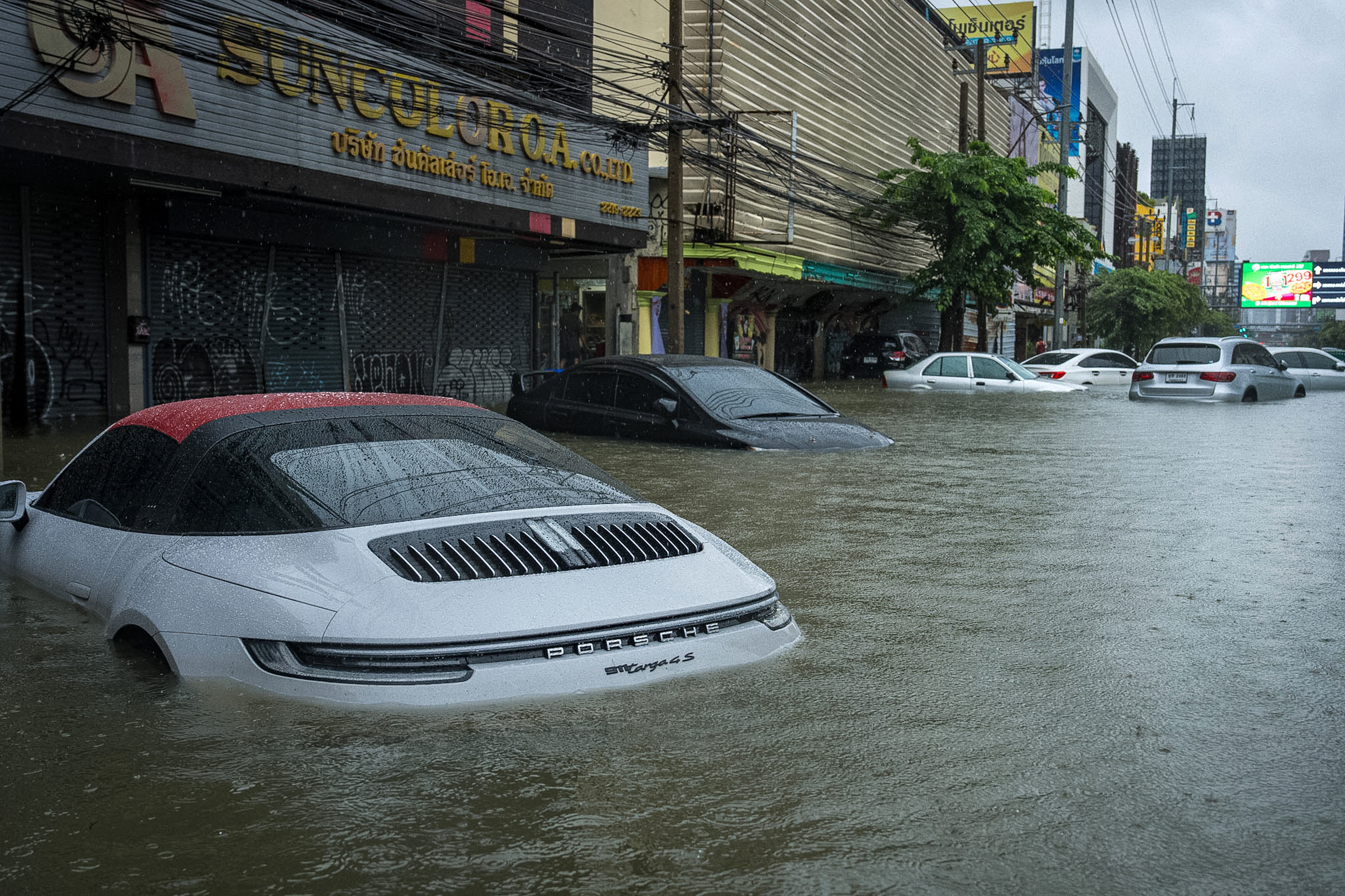 Cars are submerged in flood waters after heavy rain in Bangkok on 26 September, 2026 (AFP/Getty)