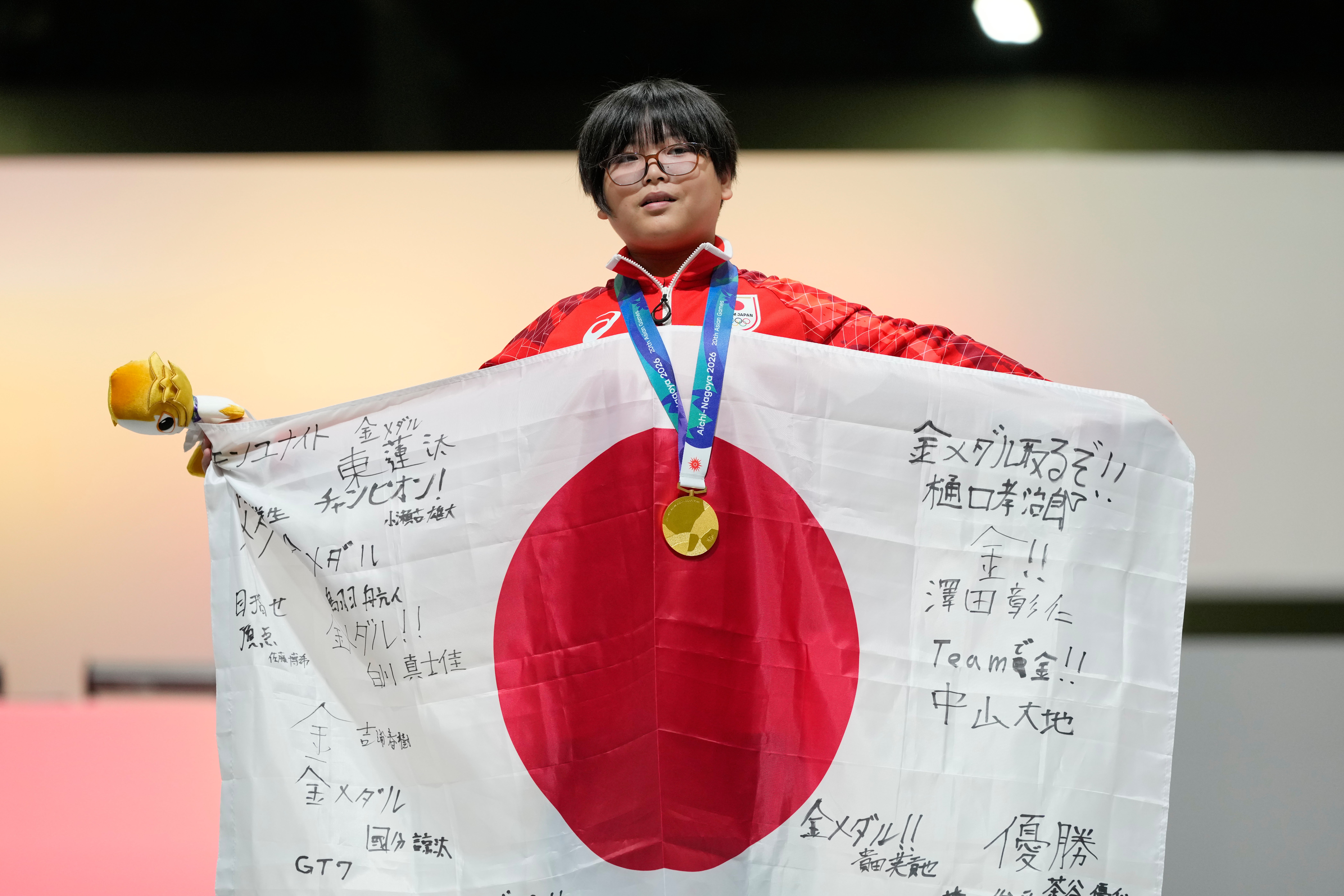 Kurihara celebrates with his gold medal after winning the Puyo Puyo Champions esports final at the Asian Games in Nagoya, Japan, Saturday, Sept. 26, 2026