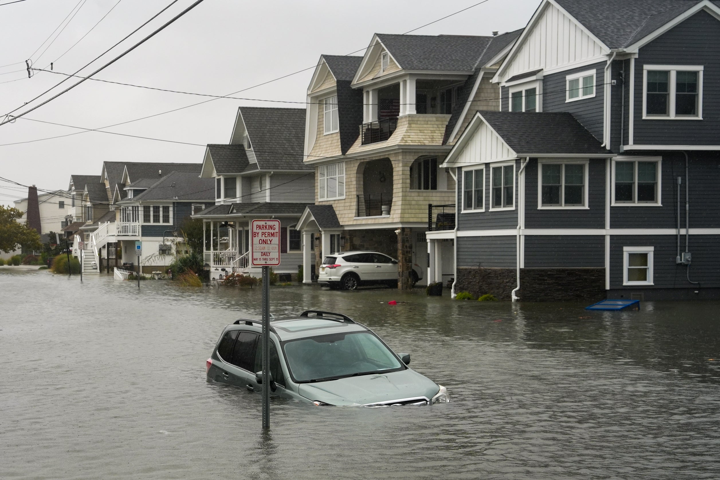 A car submerged in water on a flooded road in Point Pleasant