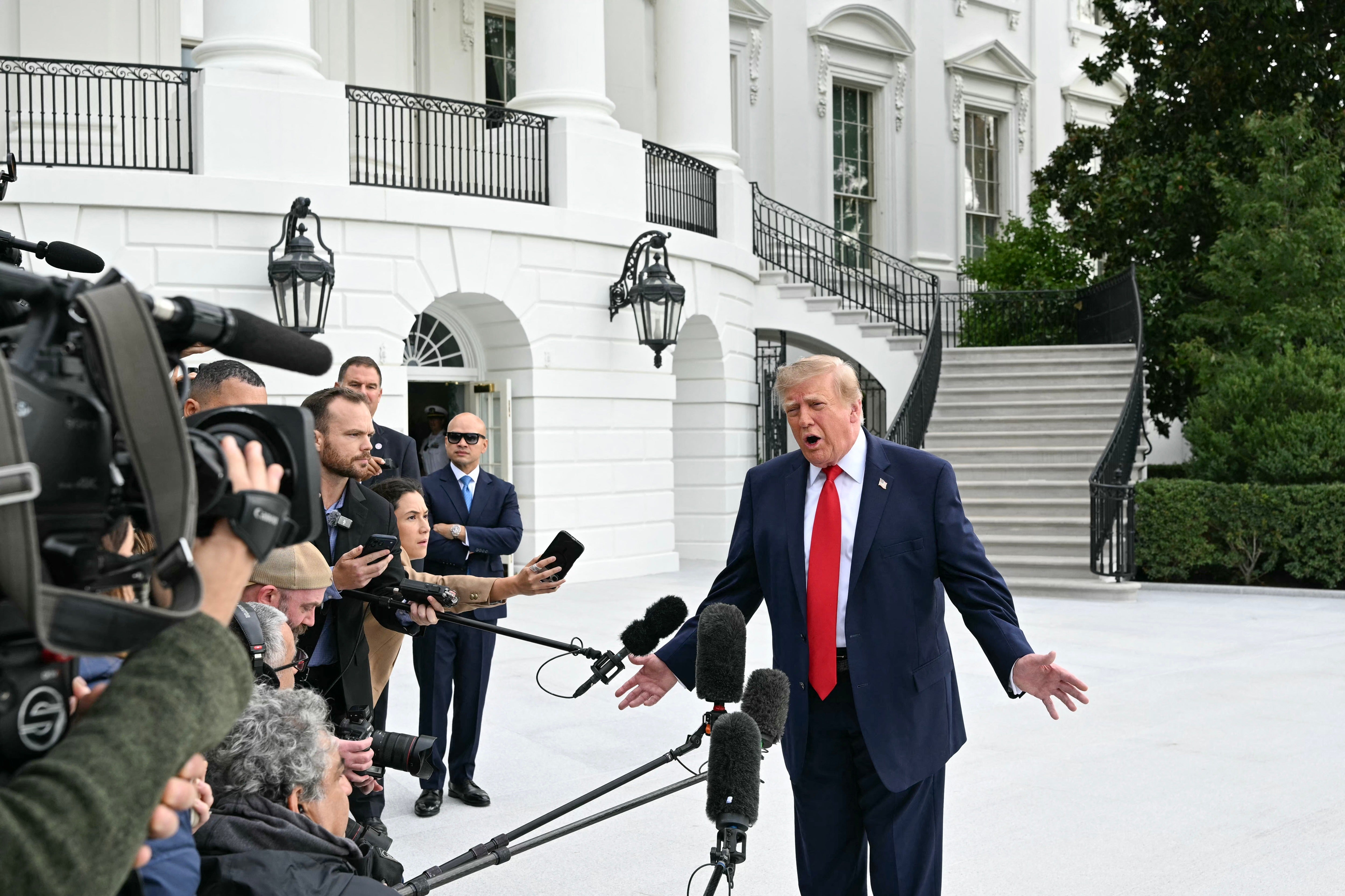 President Donald Trump disputed Barack Obama's statement that government would be better if women were in charge, telling reporters: 'It's ridiculous. I love women. I think they're great. But what a ridiculous statement that is'