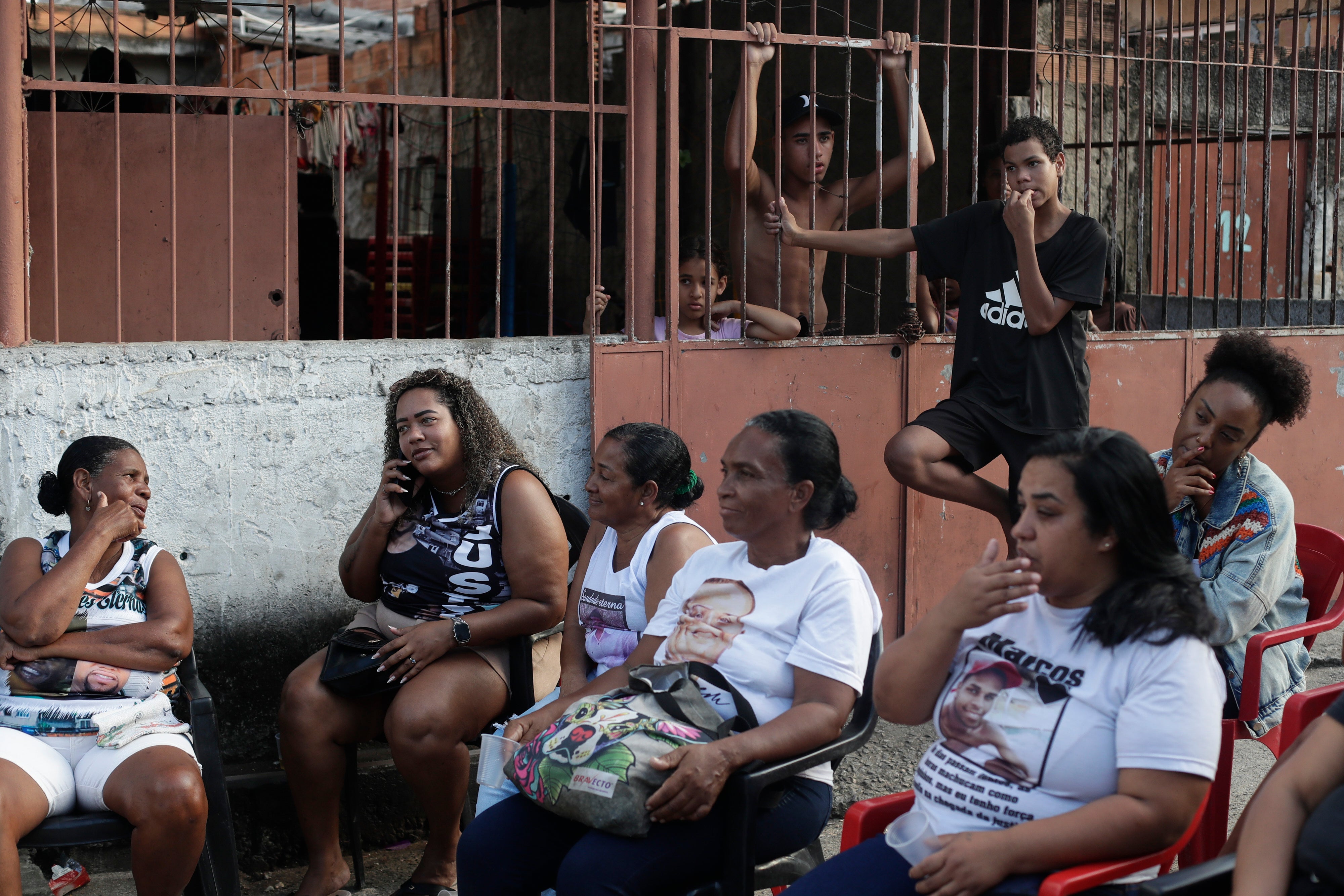 Mothers whose sons were killed by police attend a tribute event in the Morro da Crianca favela in Rio de Janeiro, Saturday, Sept. 19, 2026