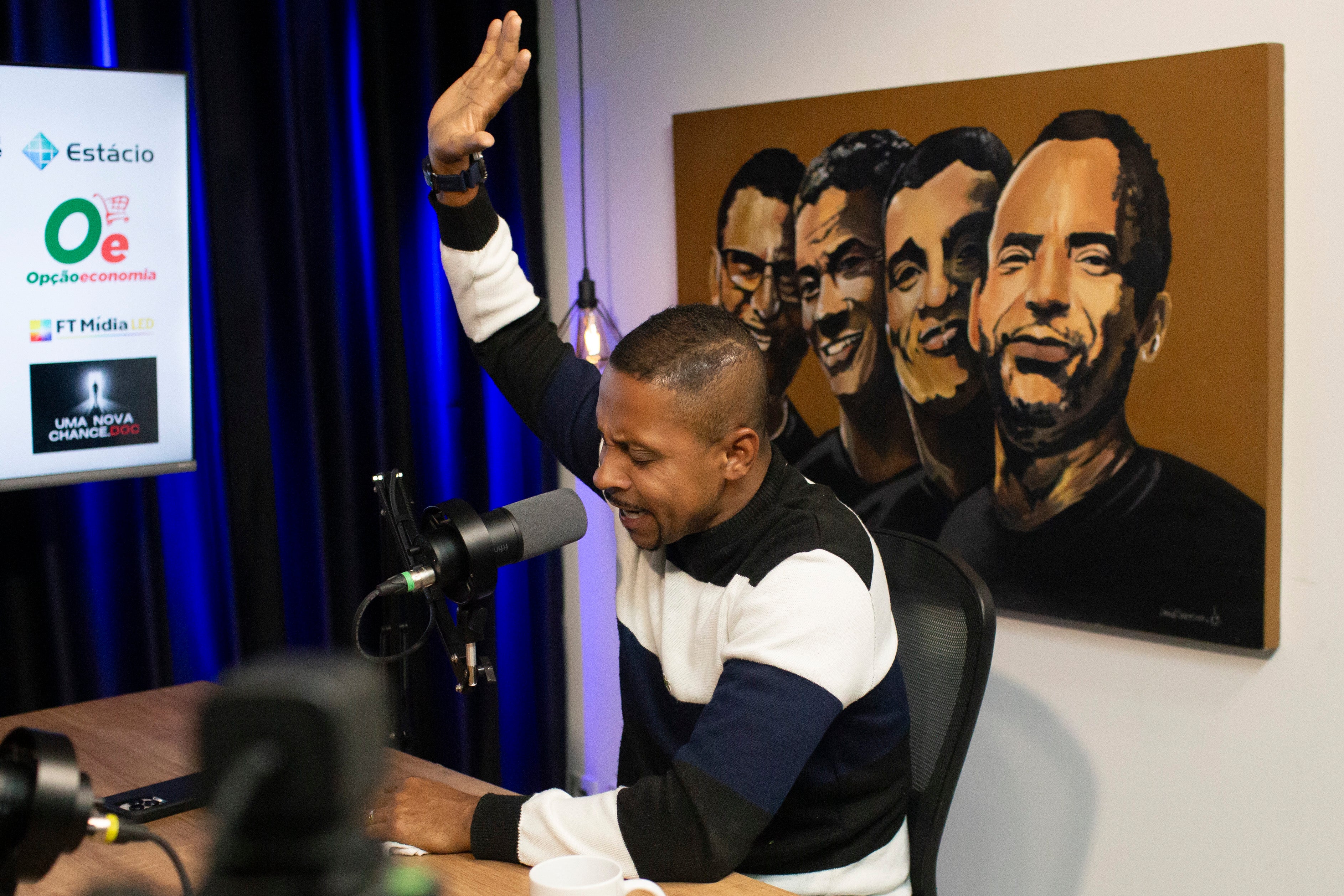 Ronaldo Pereira da Silva prays during the taping of the 