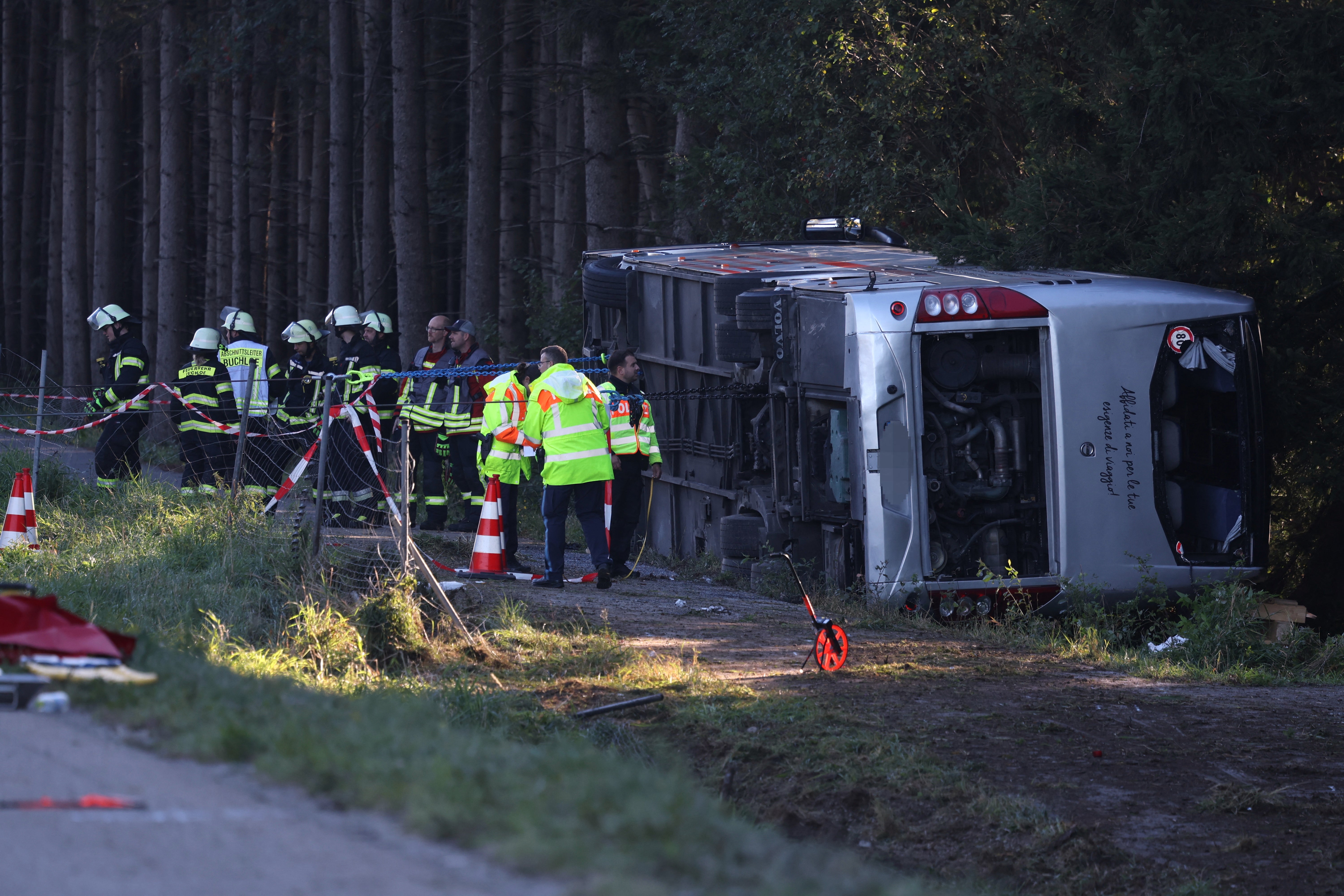 A tourist bus veered off a highway in Buchloe, Germany, and overturned on Sunday on the way to Oktoberfest