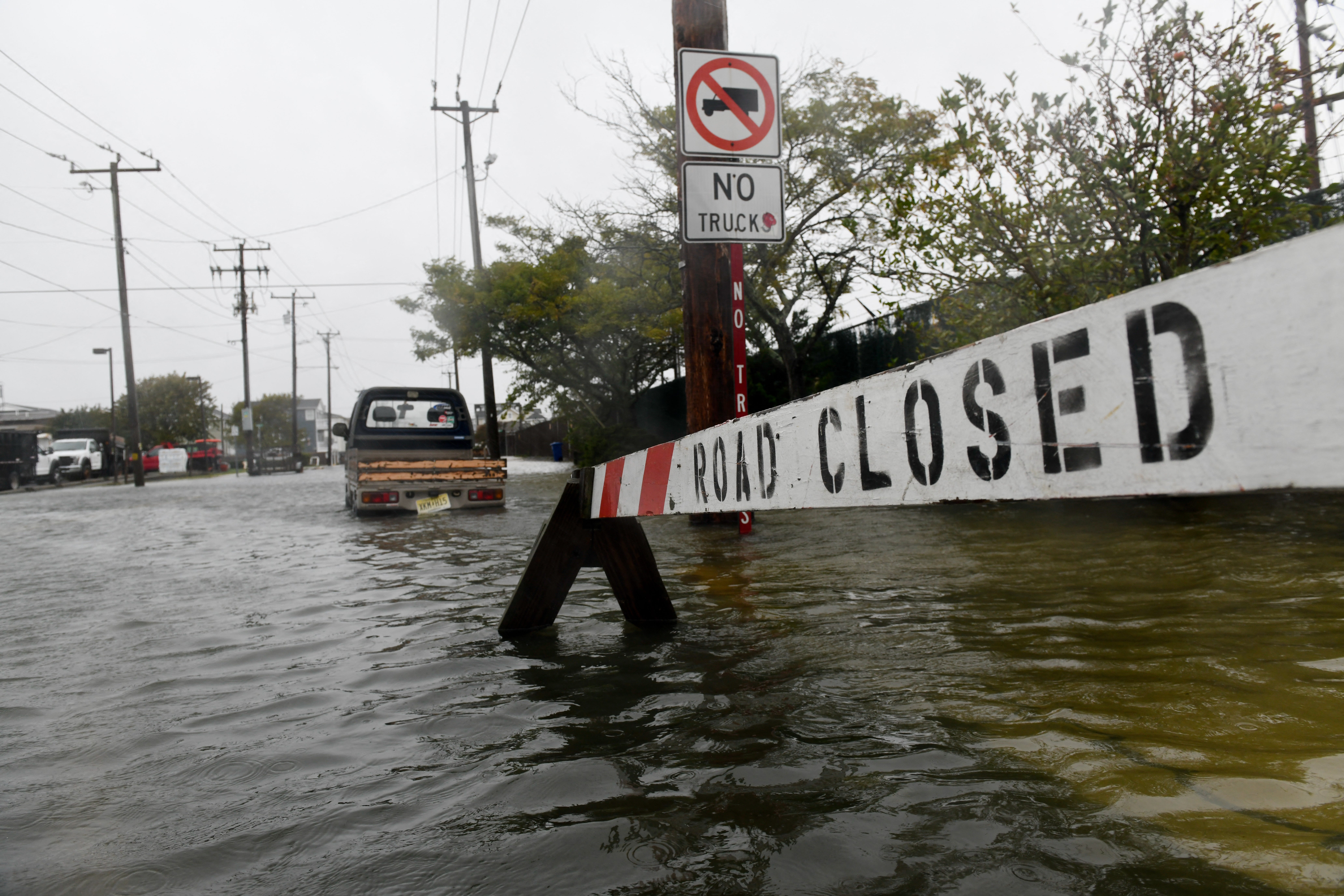 Worker killed as nor’easter battering East Coast for third day