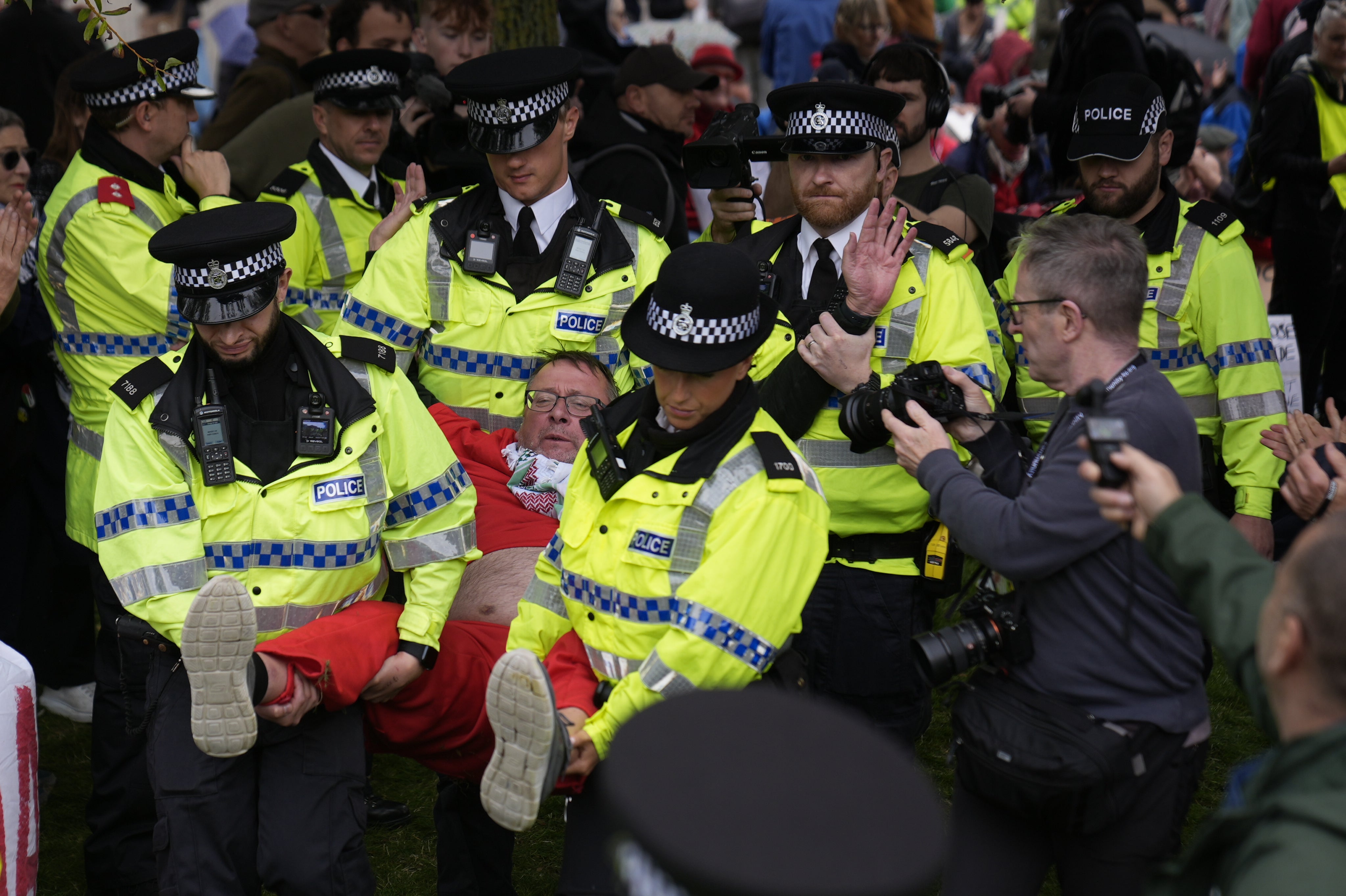 A demonstrator is removed from the protest (PA)