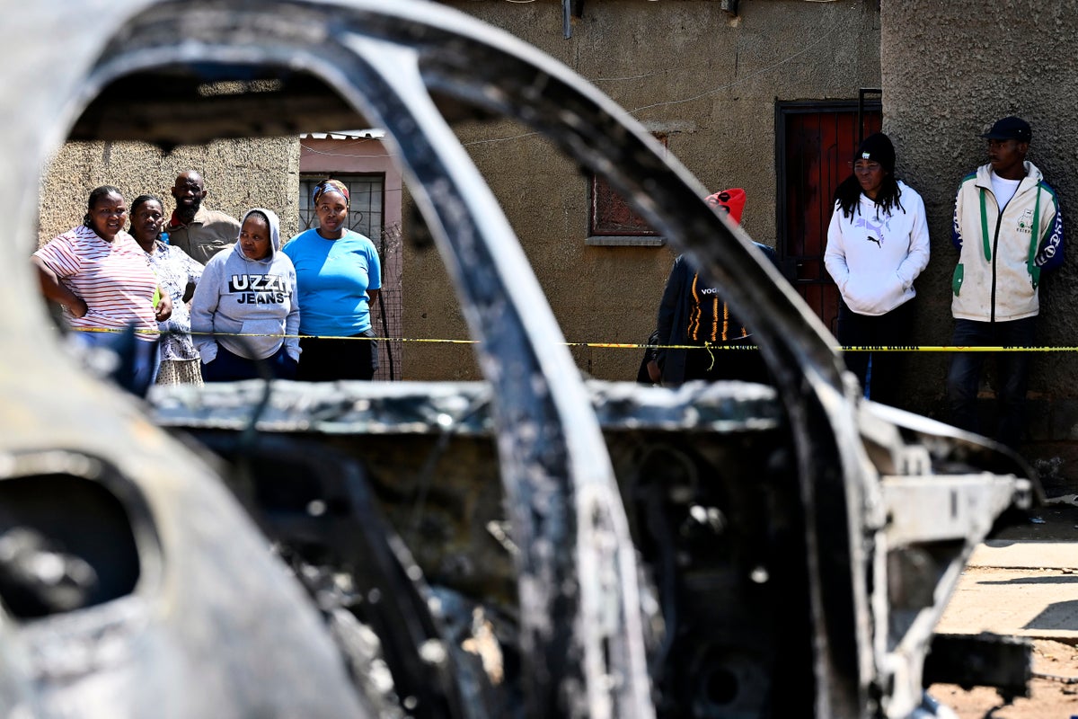 Police hunt gunmen after 2 mass shootings in South Africa leave at least 27 dead