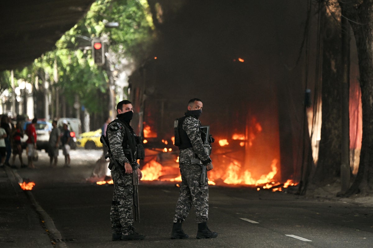 Residents find their own way to tackle gang problem in Rio after deadliest-ever police operation