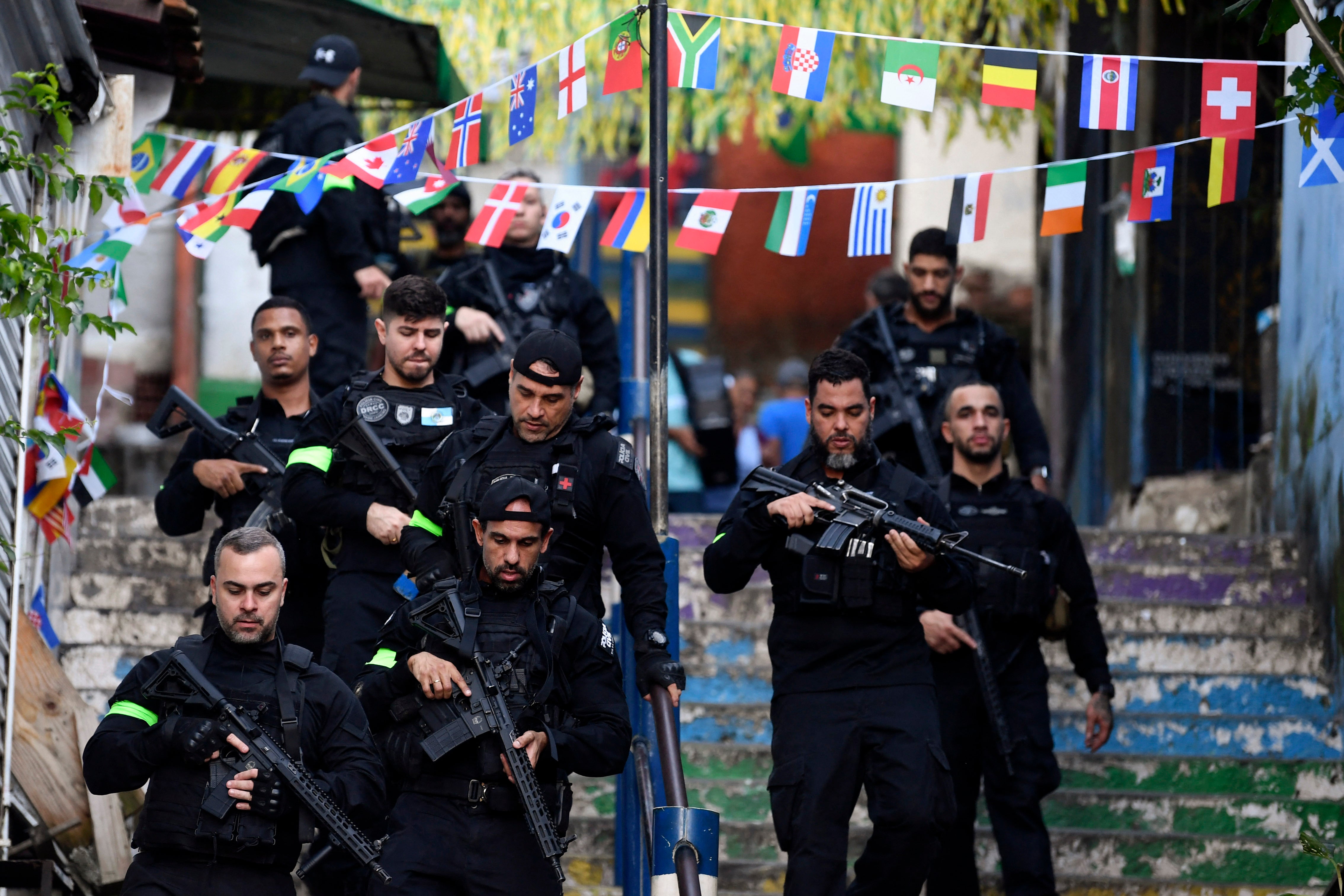 Brazilian Civil Police officers patrol a street during the Operation Containment at the Santa Marta favela, in Rio de Janeiro, Brazil, on June 23, 2026