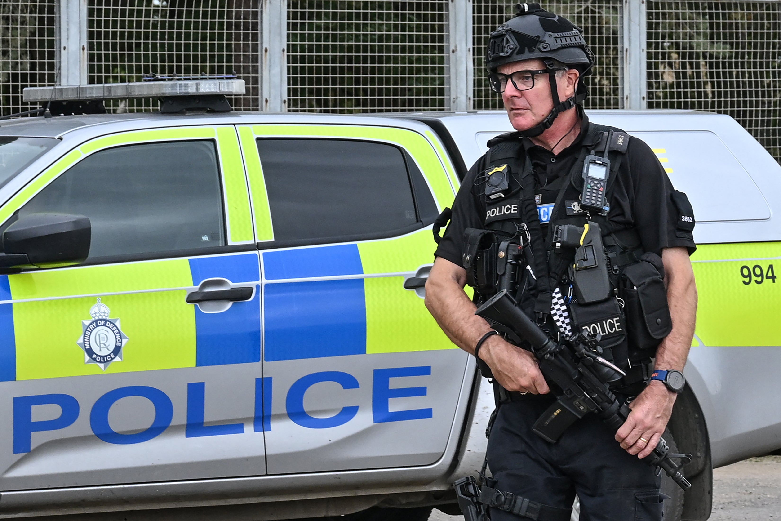 An armed policeman mans a roadblock at an entrance to RAF Fairford base in Fairford, south-west England on September 27, 2026