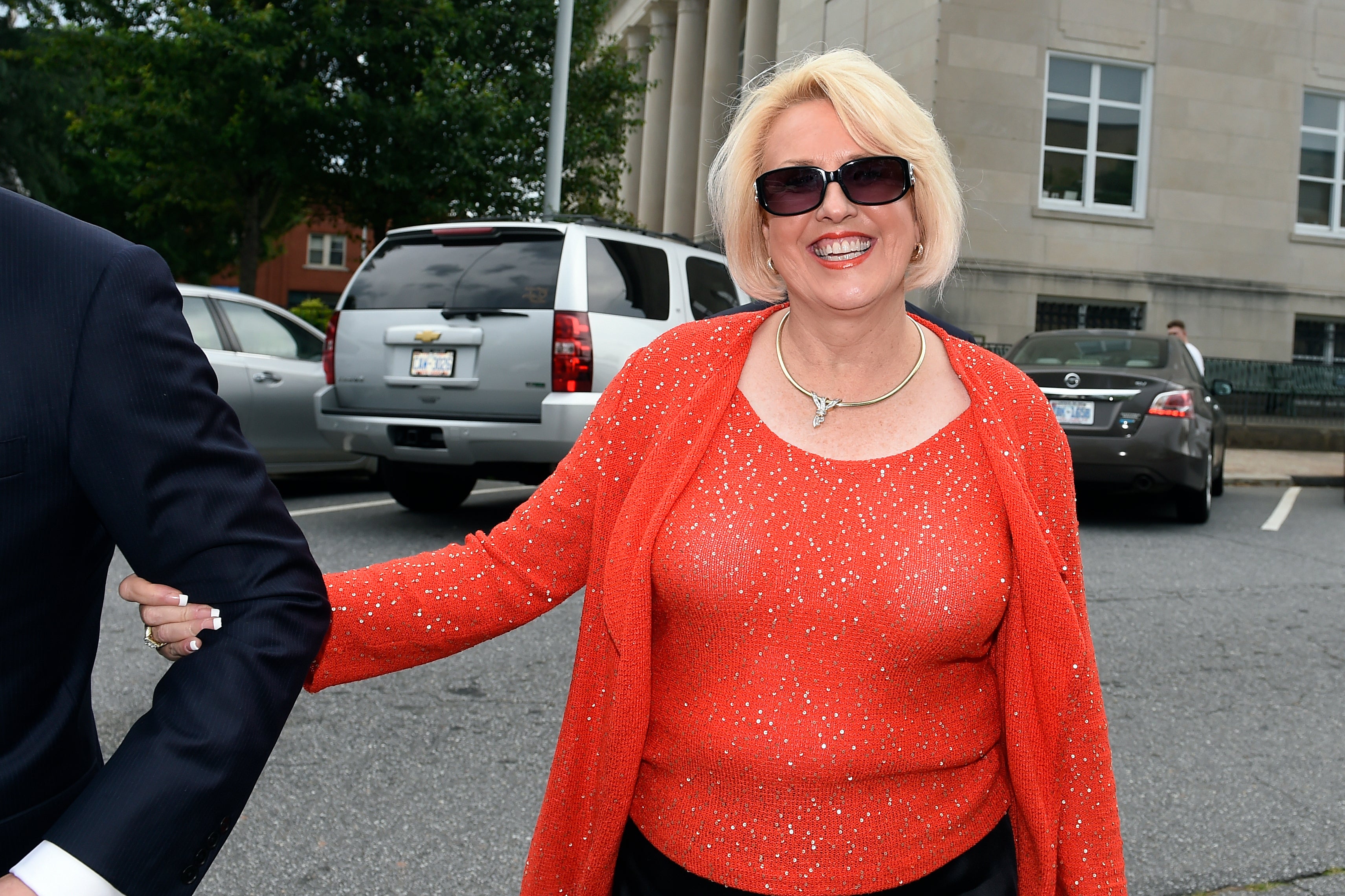 Brooke Covington, a member of the Word of Faith Fellowship church in Spindle, N.C., leaves a hearing at Rutherford County Courthouse in Rutherfordton