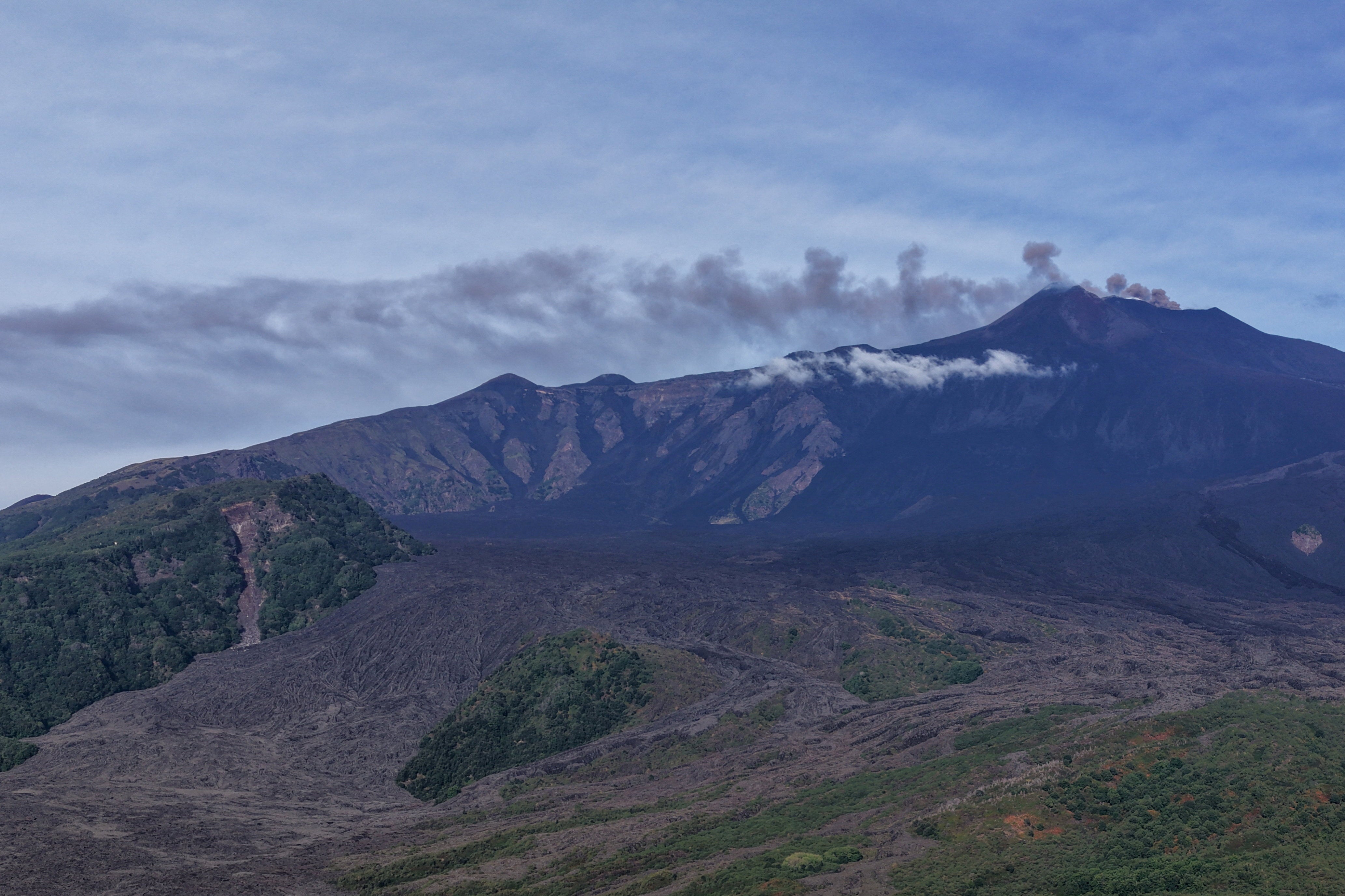 A view shows volcanic ash and fumes rising during an eruption at Mount Etna, as seen from Milo, Sicily, Italy, September 14, 2026