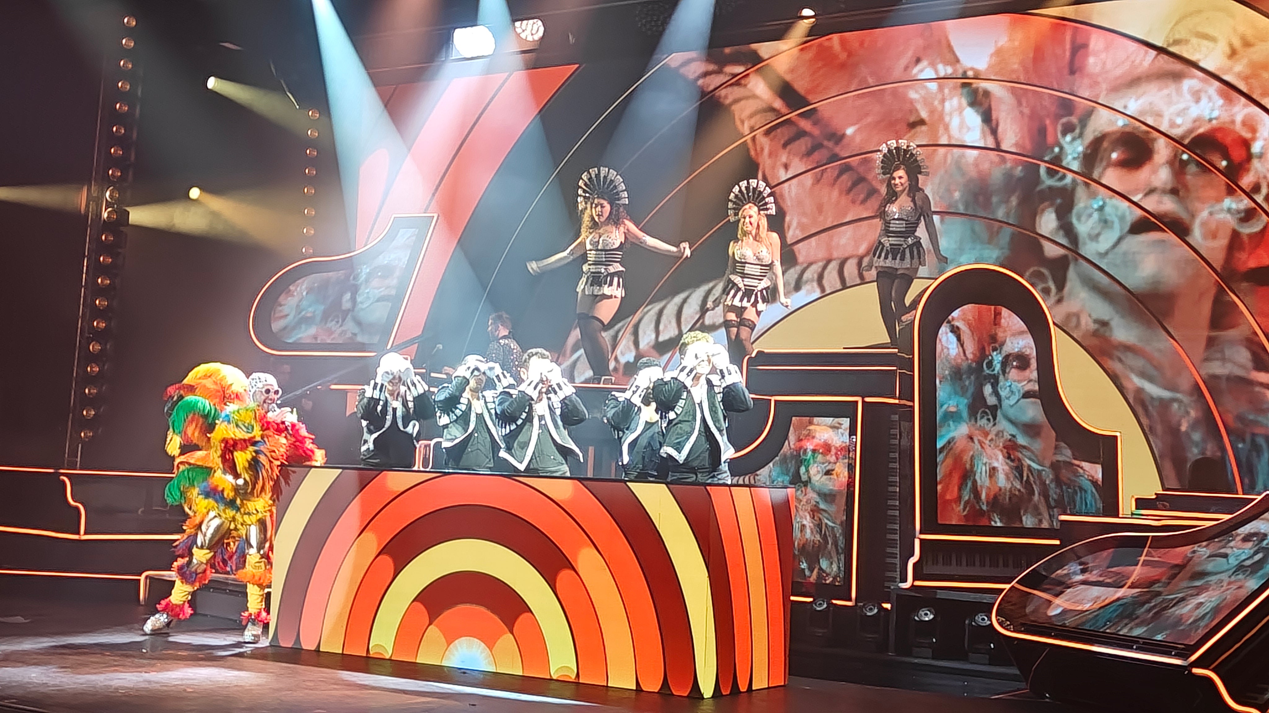The Elton John show aboard Norwegian Luna features many of the star's famous stage outfits