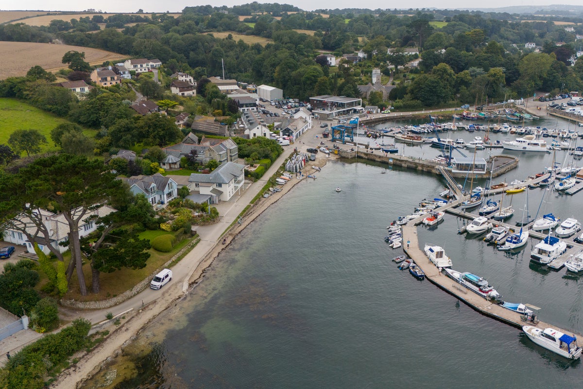 Ten people arrested after migrant boat lands at tiny harbour in Cornwall