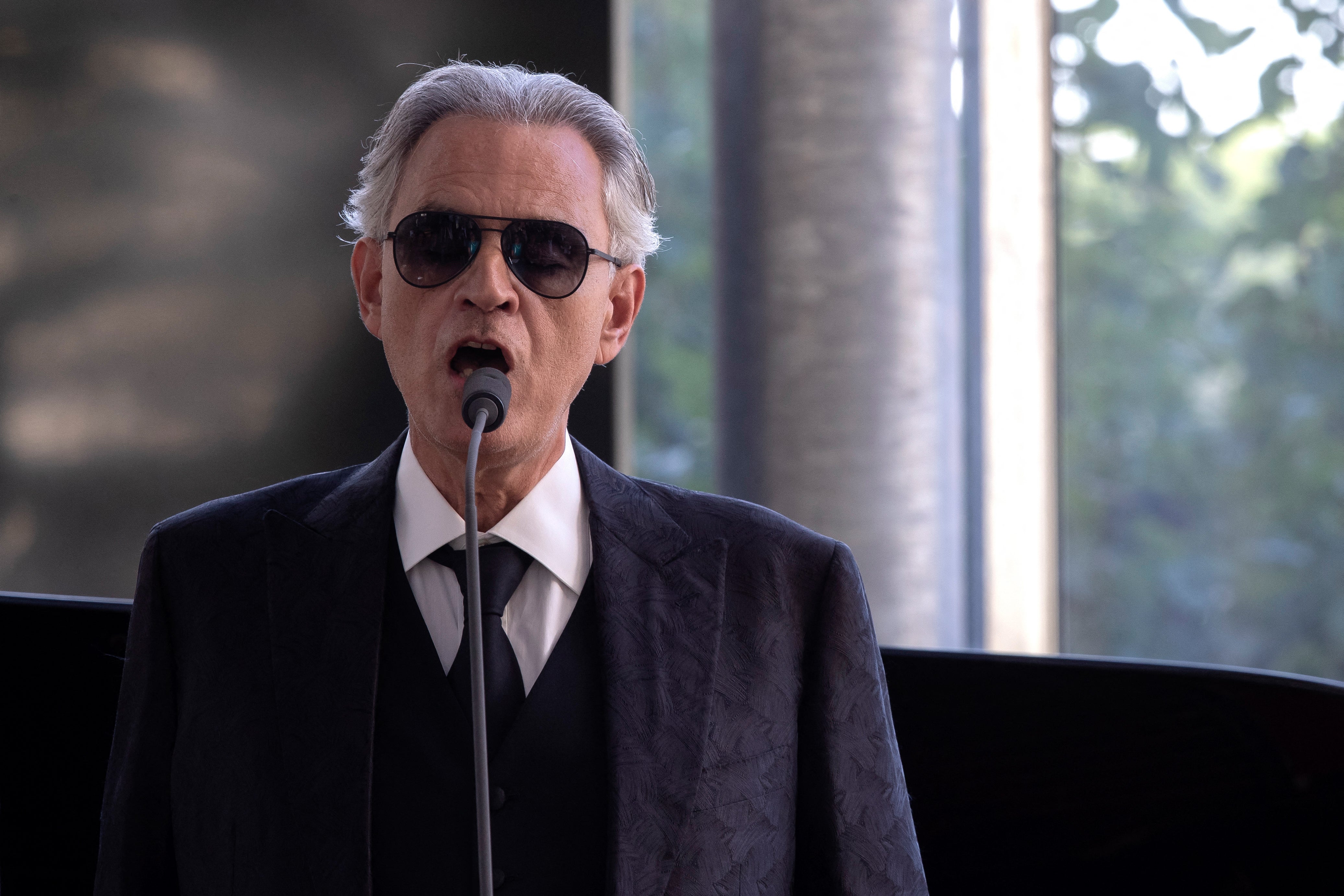 Andrea Bocelli  sings at the inauguration of the Borgo Laudato Si', attended by Pope Leo XIV in Castel Gandolfo, near Rome. (AFP/Getty)
