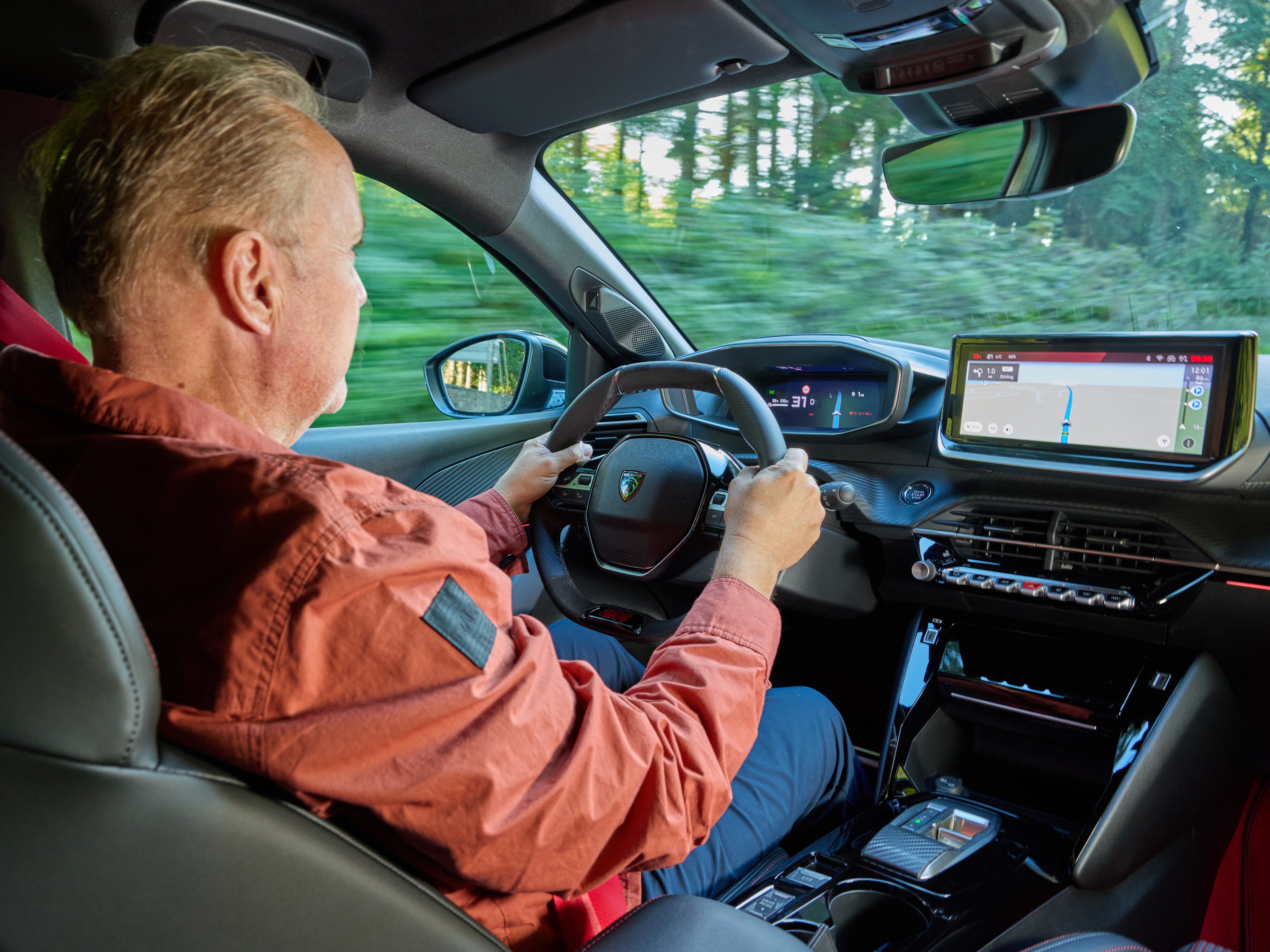 This is where the fun starts in the Peugeot E-208 GTi, although the cabin feels old (Peugeot)