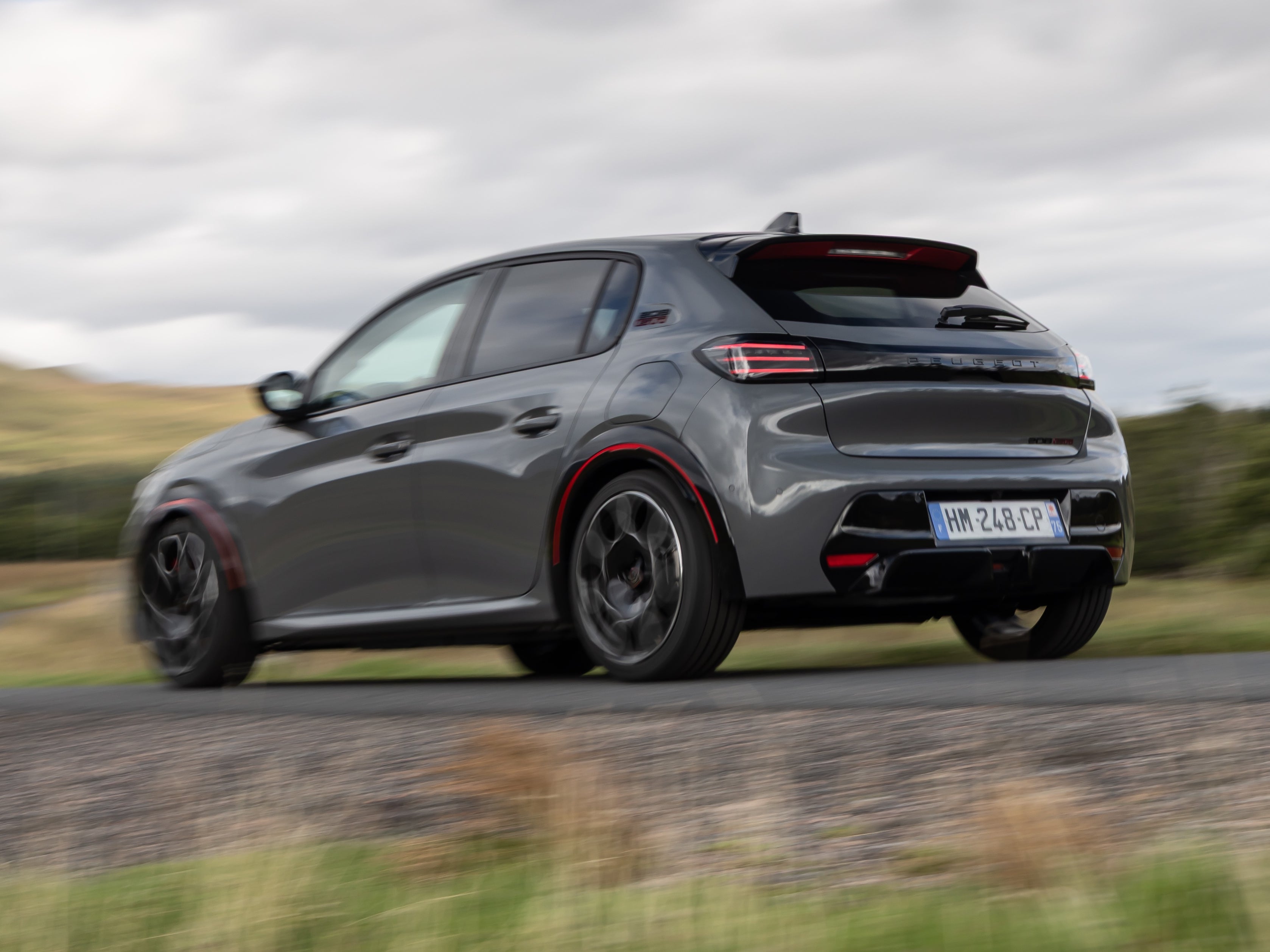 Styling tweaks on the outside of the Peugeot E-208 GTi are subtle but effective – with a hint of retro style (Peugeot)