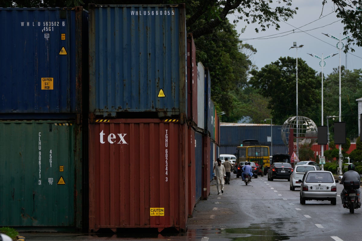 Shipping containers appear on Islamabad roads as protest restrictions loom