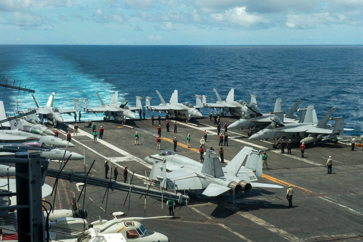 Aviators eject into sea and four sailors are injured in dramatic USS Eisenhower crash