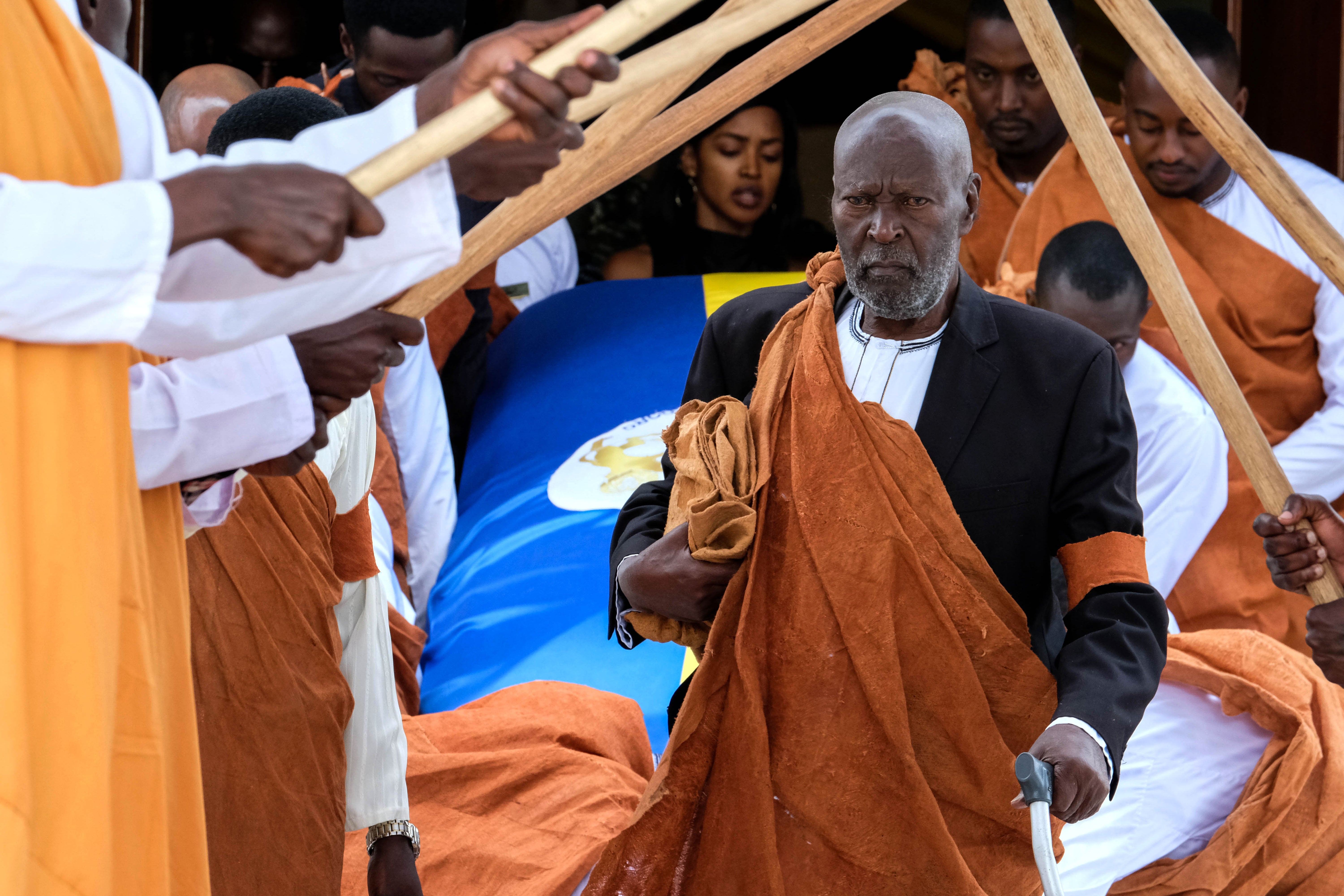 Charles Kayondo Kamurasi, head of the Babiito royal clan, walks out of Karuziika Royal Palace, where the body of the late Omukama, Oyo Nyimba Kabamba Iguru Rukidi IV of Toro lies in state ahead of the burial at the Karambi Royal Tombs on September 12, 2026 in Fort Portal, Uganda