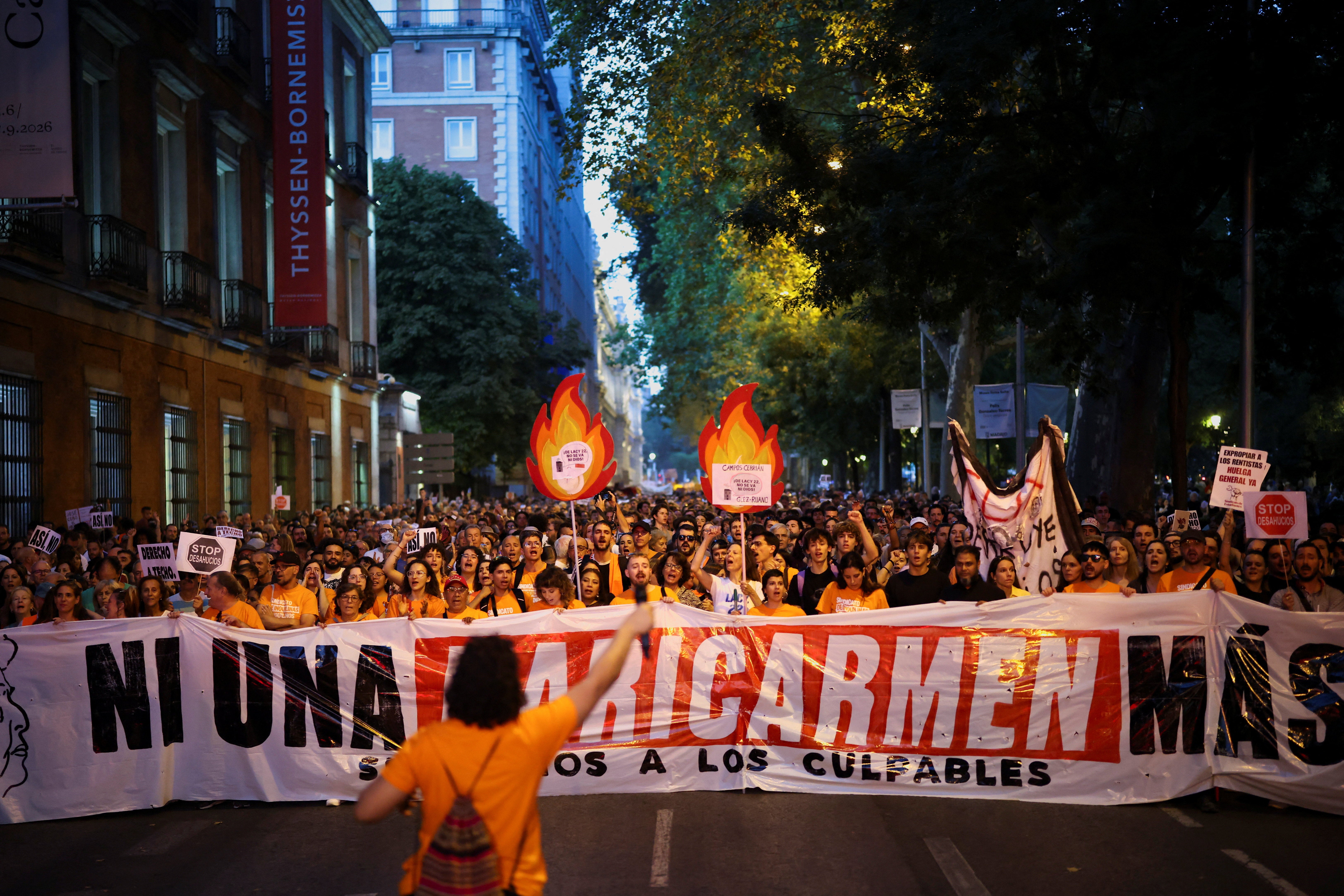 Demonstrators hold a banner reading: "Not one Maricarmen more" during a protest against Spain's housing crisis