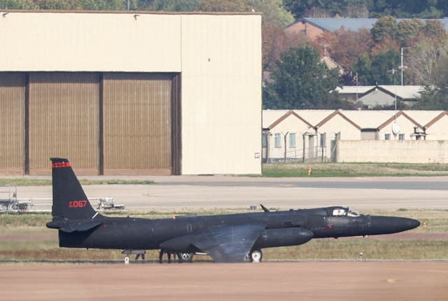 A U-2 reconnaissance aircraft lands at RAF Fairford on Tuesday, after the suspected terror plot