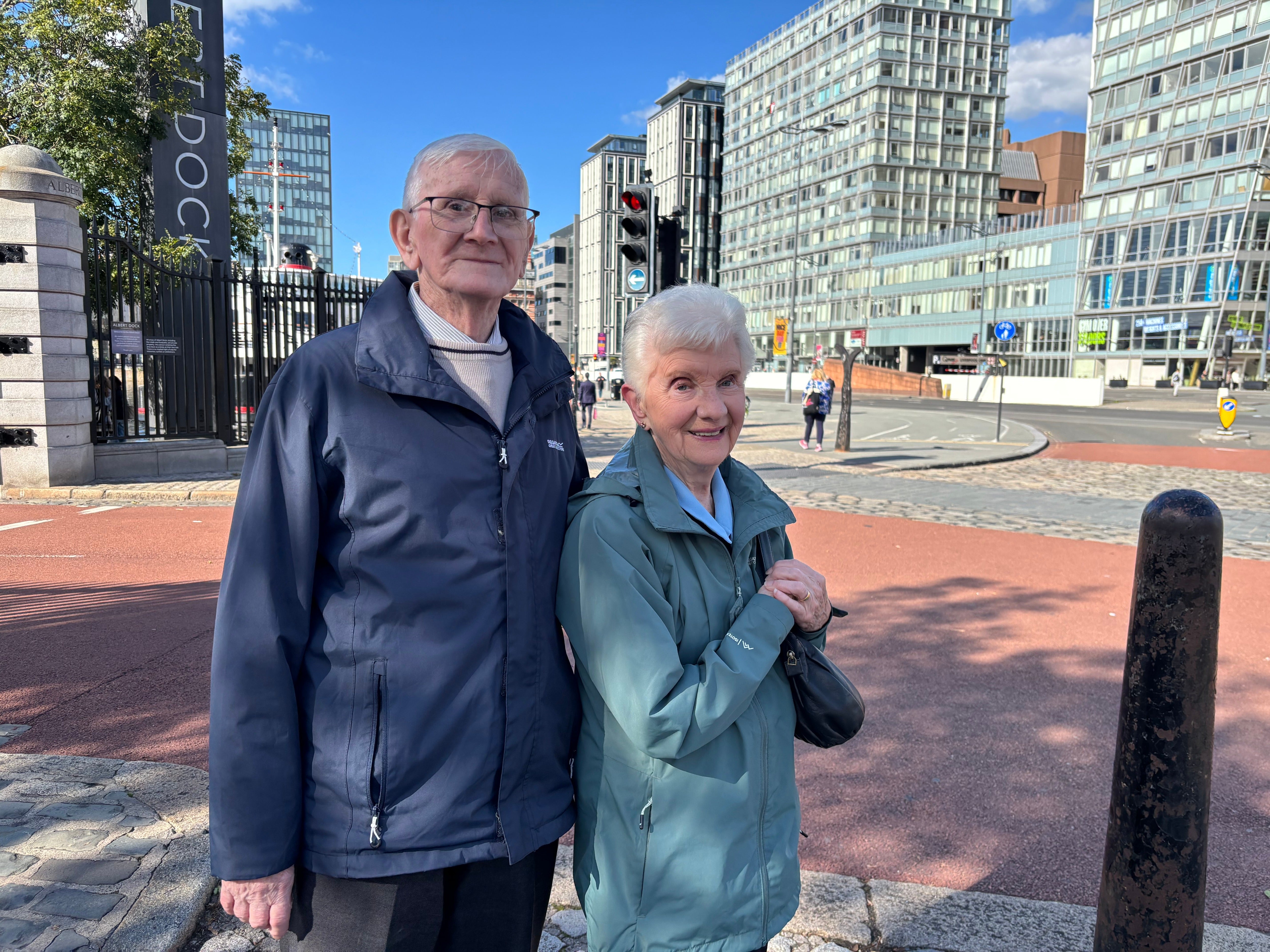 Barry and Mary Leatham, from Liverpool, have conflicting views on Andy Burnham (The Independent)