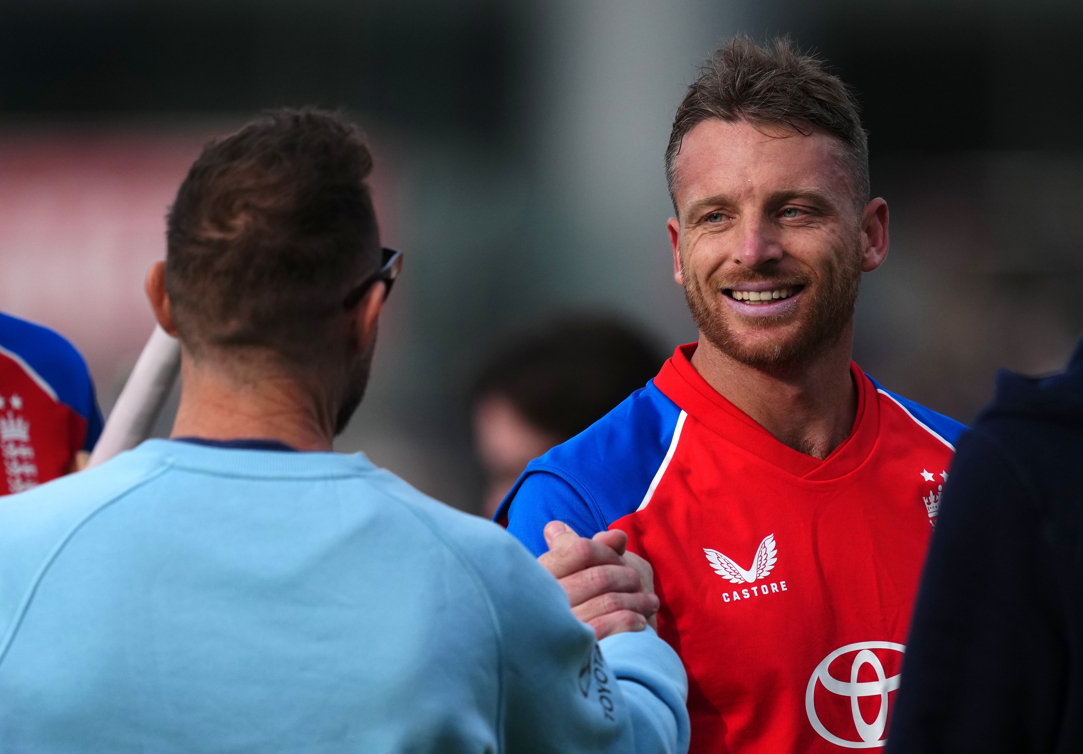 McCullum (left) greets Jos Buttler (right). (Martin Rickett/PA)