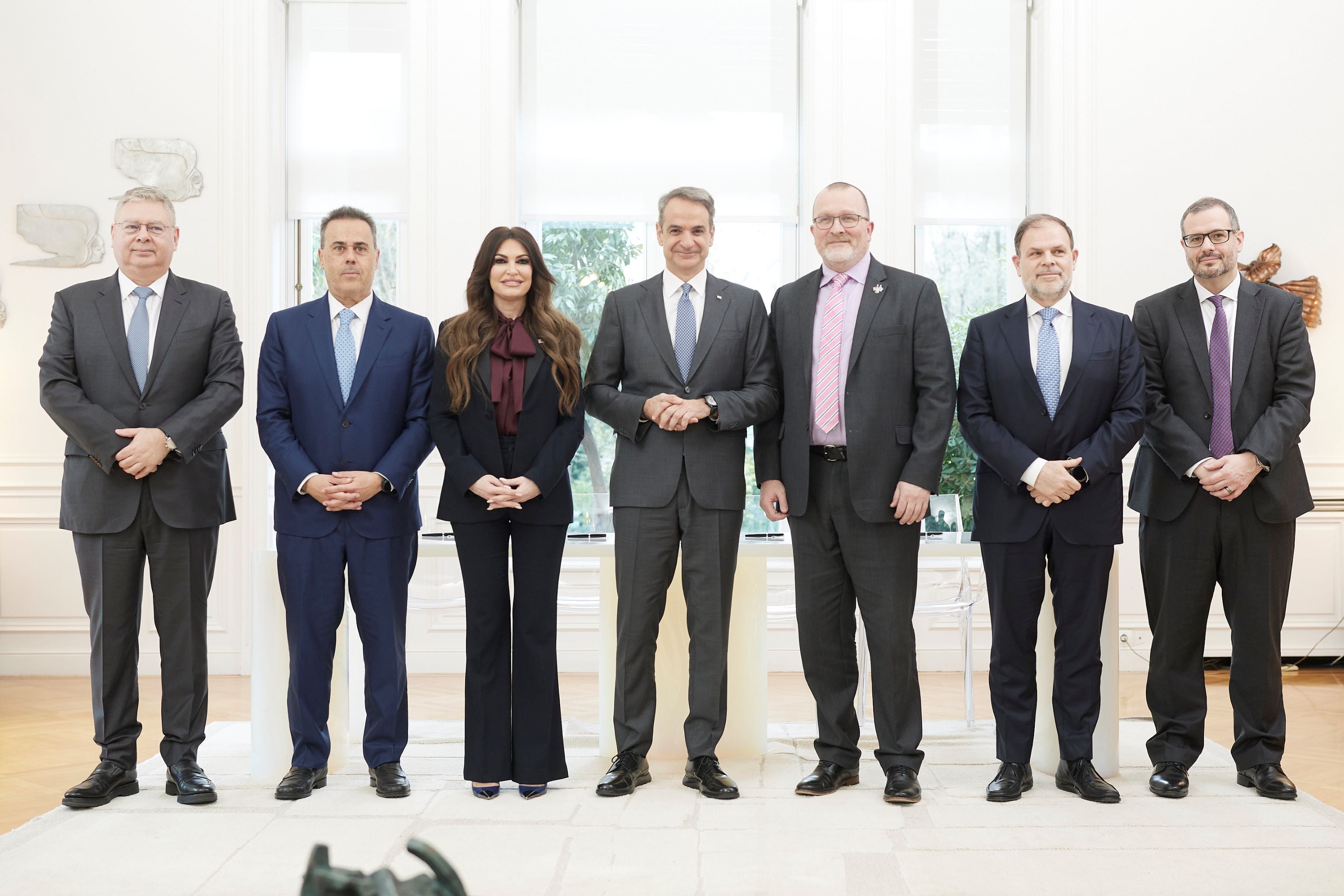 Guilfoyle with Greek politicians including energy minister Stavrous Papastravou (to Guilfoyle's left in the image)