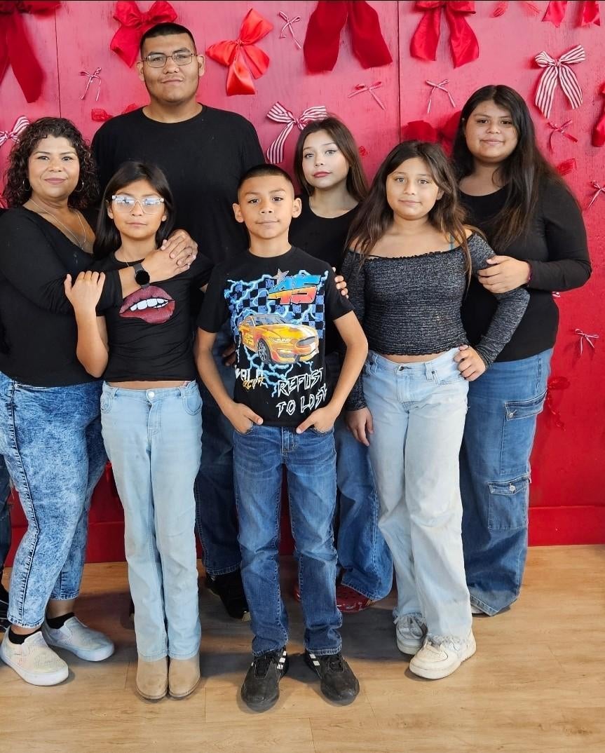 Ramirez, far left, pictured with her six children, says that she now doesn’t go anywhere without her birth certificate. ‘We are from America. This is our home,’ she said
