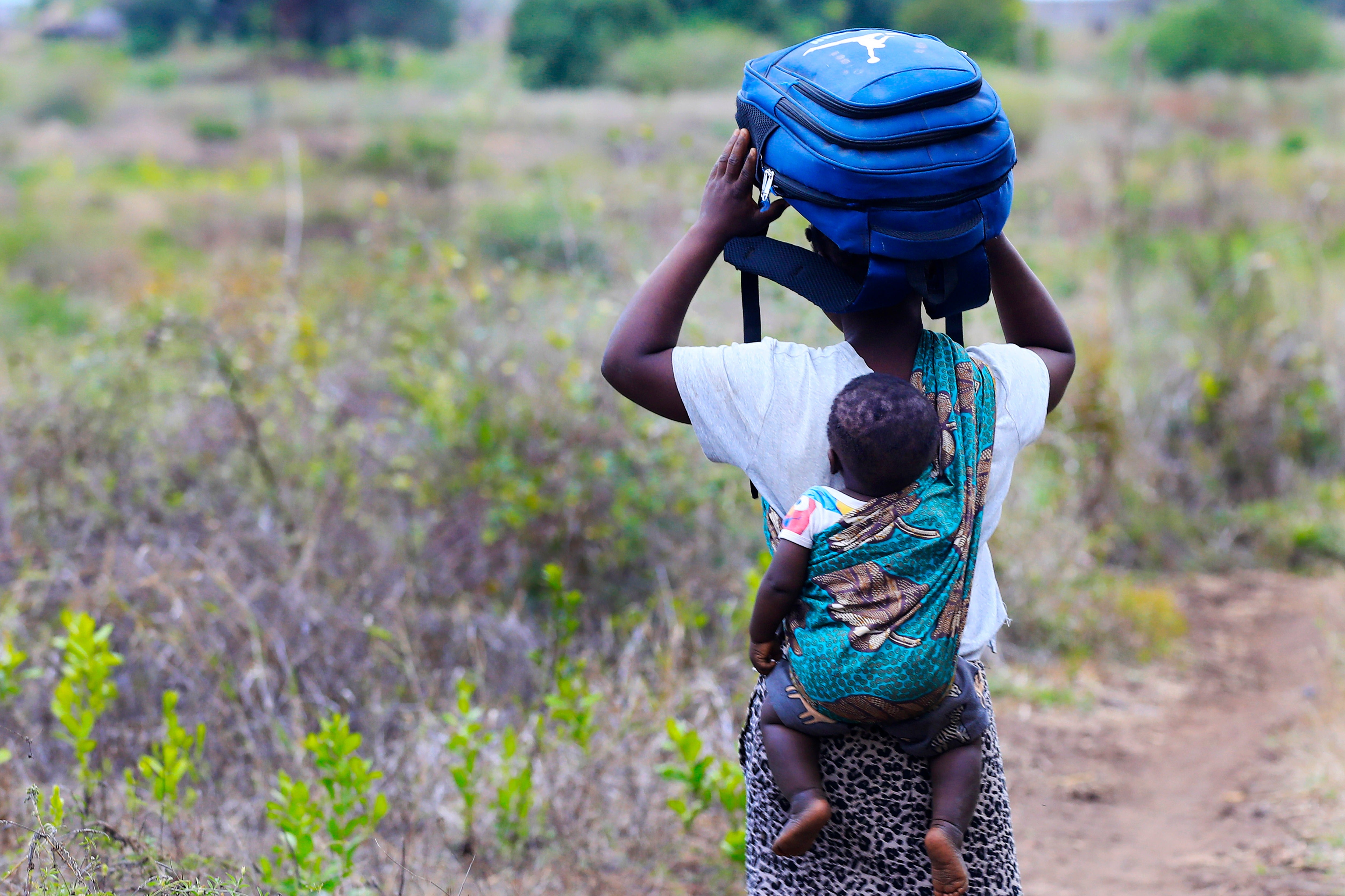 carrying-baby-on-back.jpg