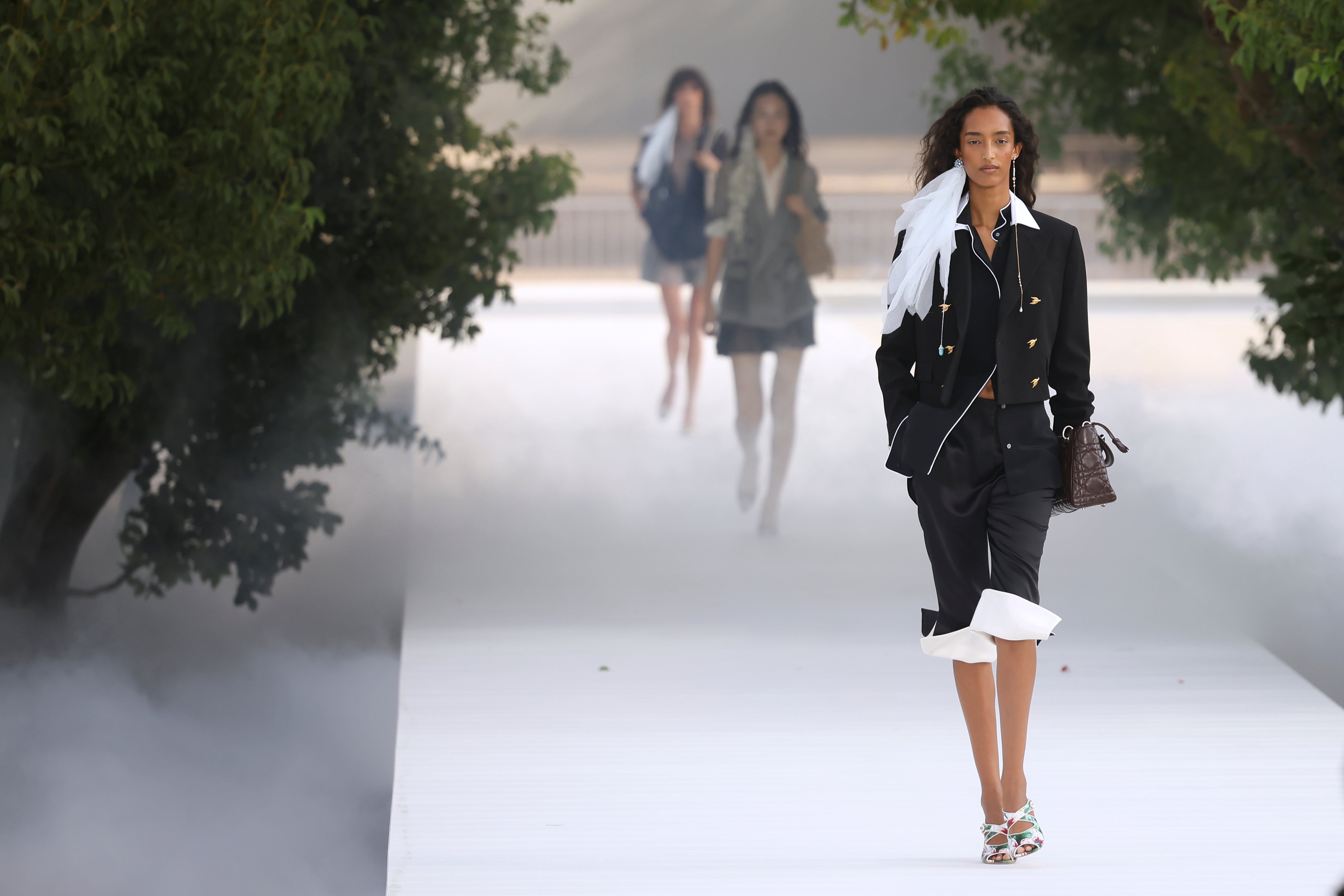 Pyjama-style piping and unevenly buttoned shirts were sent down the runway (Thomas Padilla/AP) (AP)
