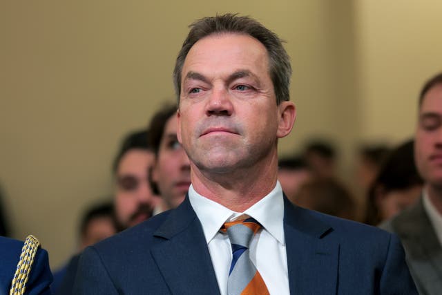 The divorce filing came months after photos were released of Bryon wearing pink shorts and a skin-colored top with two balloons tucked into it to look like huge breasts