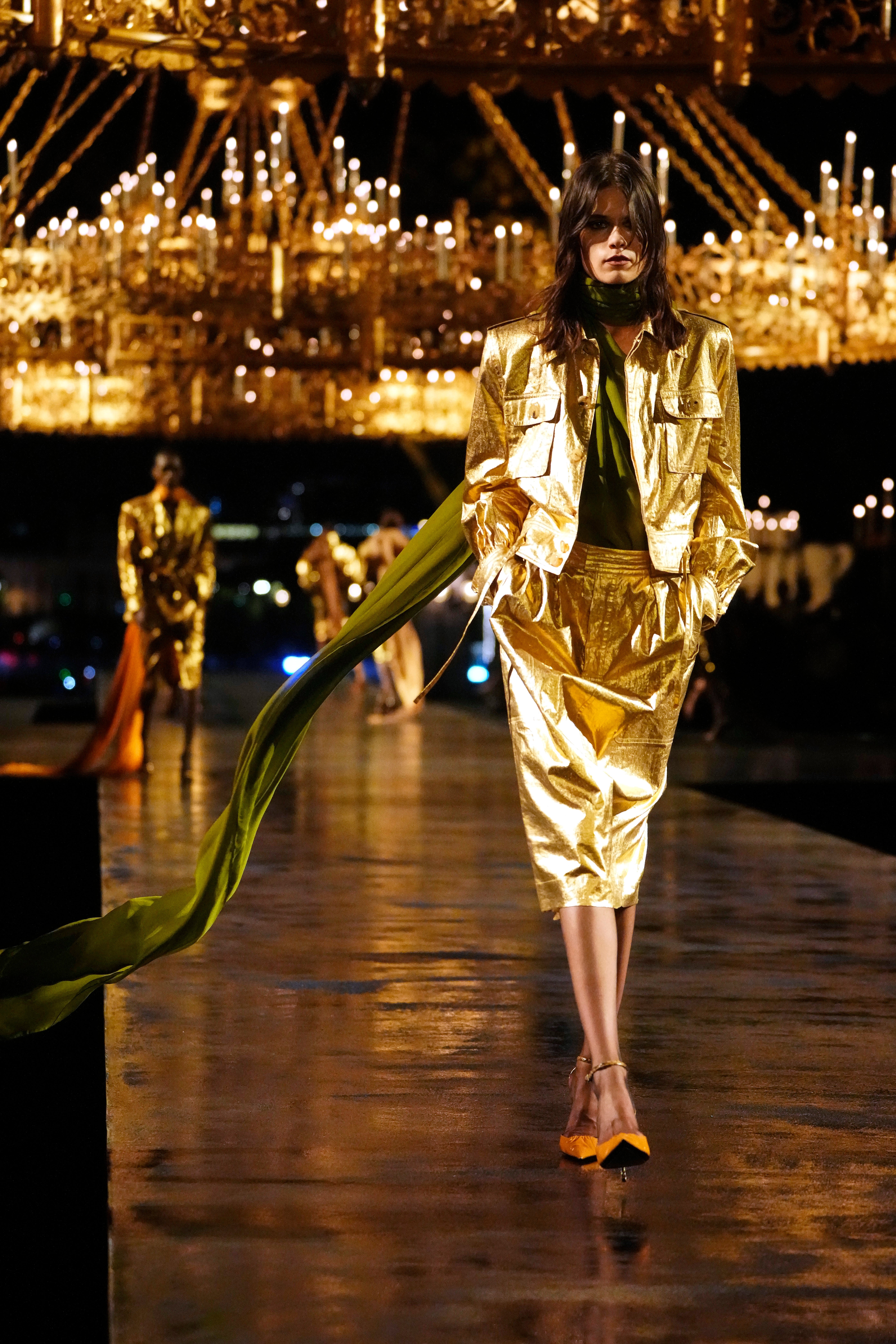 Gold iteration of different jacket styles wear paired with matching pencil skirts – a SS27 runway trend (Teresa Suarez/AP) (AP)
