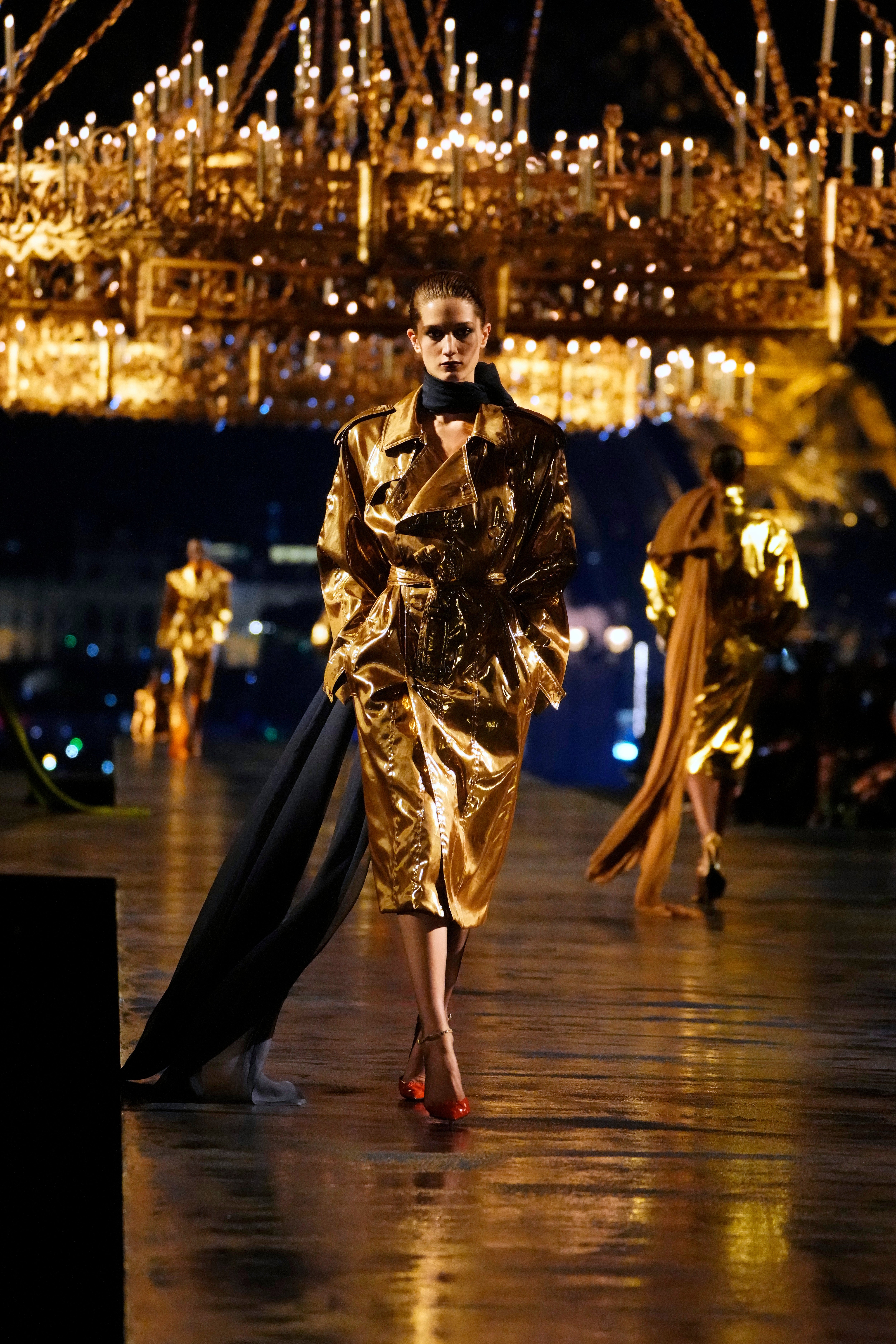 Tightly belted all-gold looks dominated the runway (Teresa Suarez/AP) (AP)