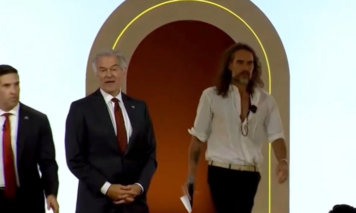 British comedian and actor Russell Brand and Dr. Mehmet Oz joked about hugging a female member of Donald Trump’s Cabinet during a panel at a summit promoting the 'Make America Healthy Again' movement