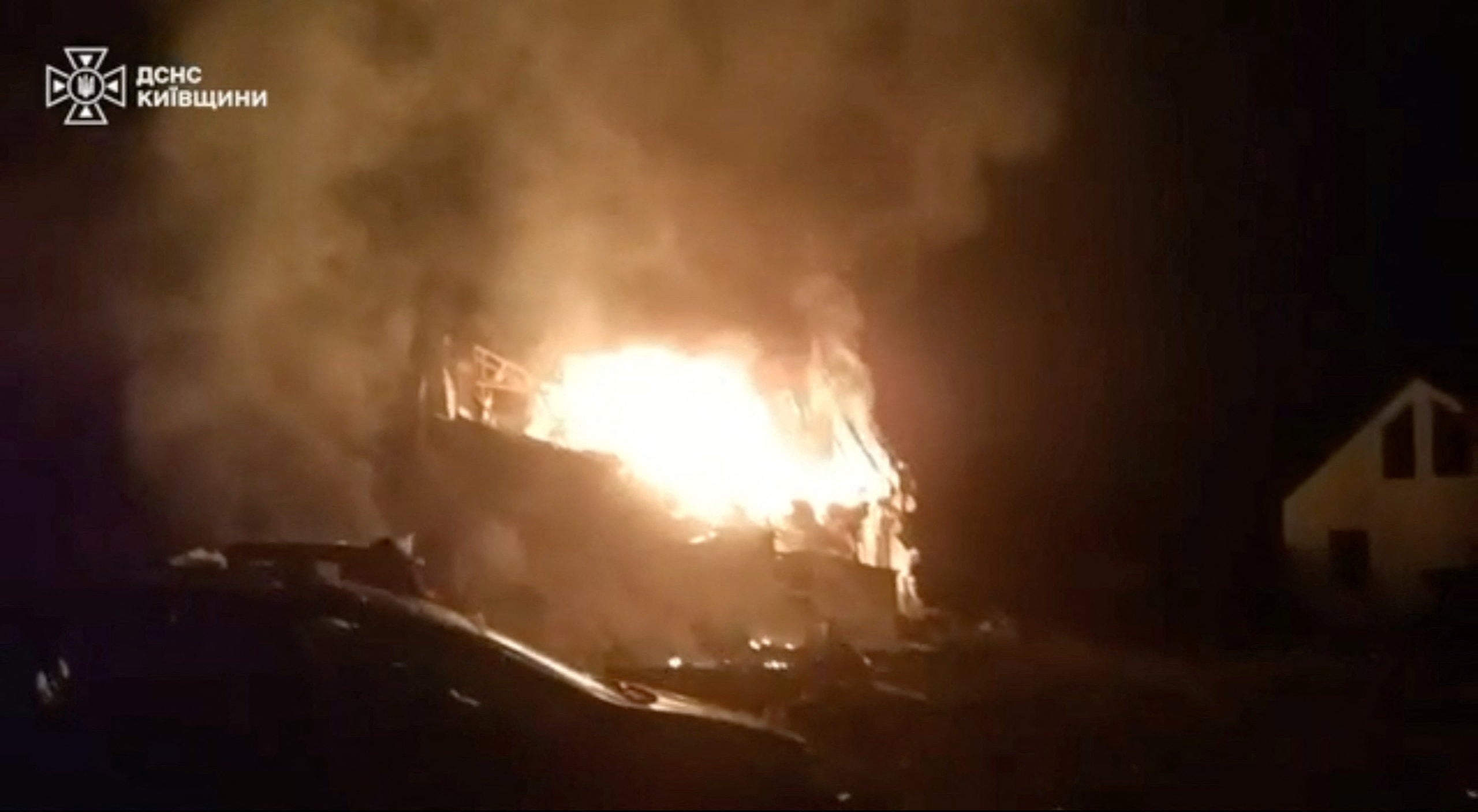 A fire in a structure burns, in the aftermath of a Russian drone strike, amid Russia's attack on Ukraine, at a location given as Kyiv (Reuters)
