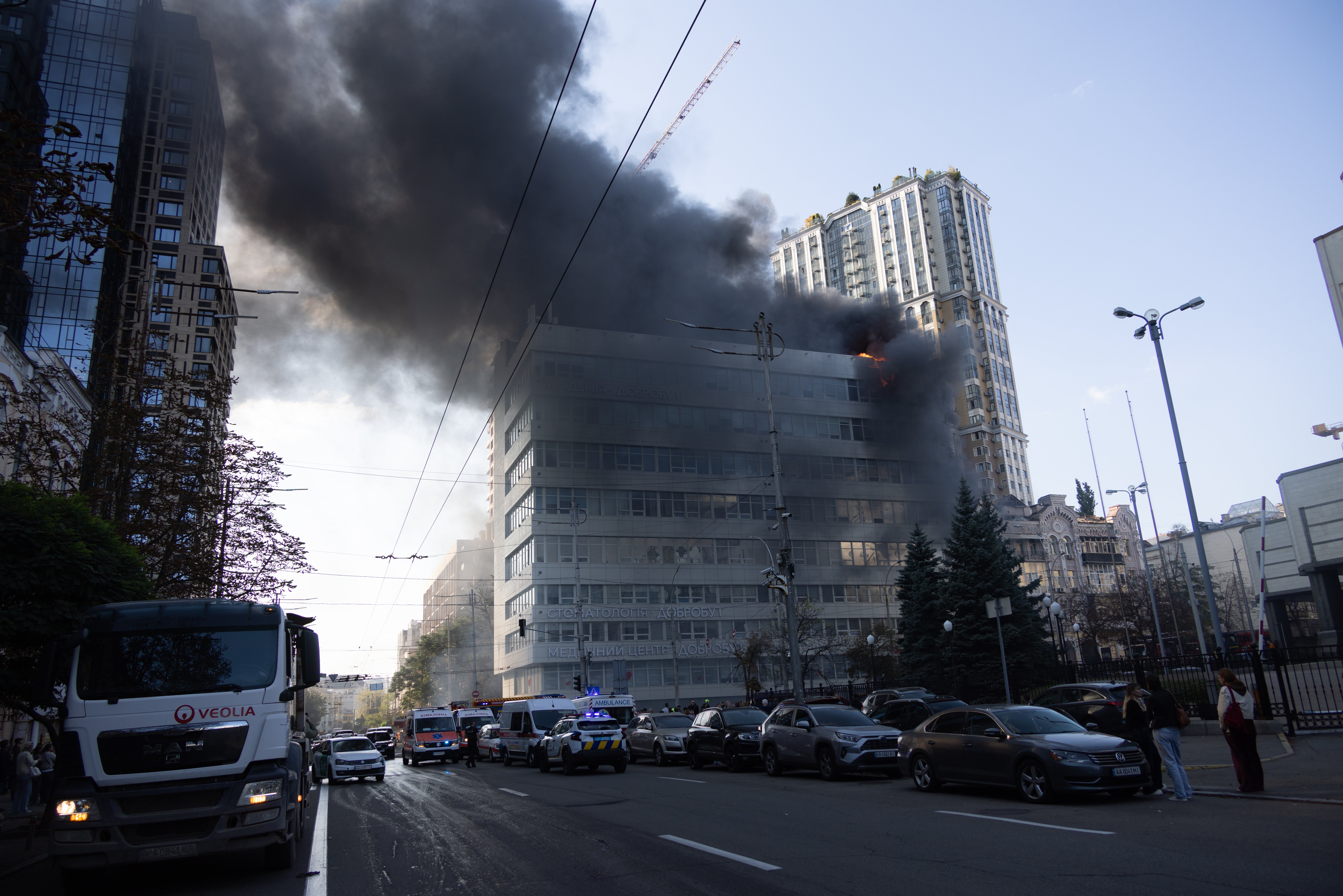 The building of the private medical clinic Dobrobut burns following a second Russian drone strike on central Kyiv (Getty)