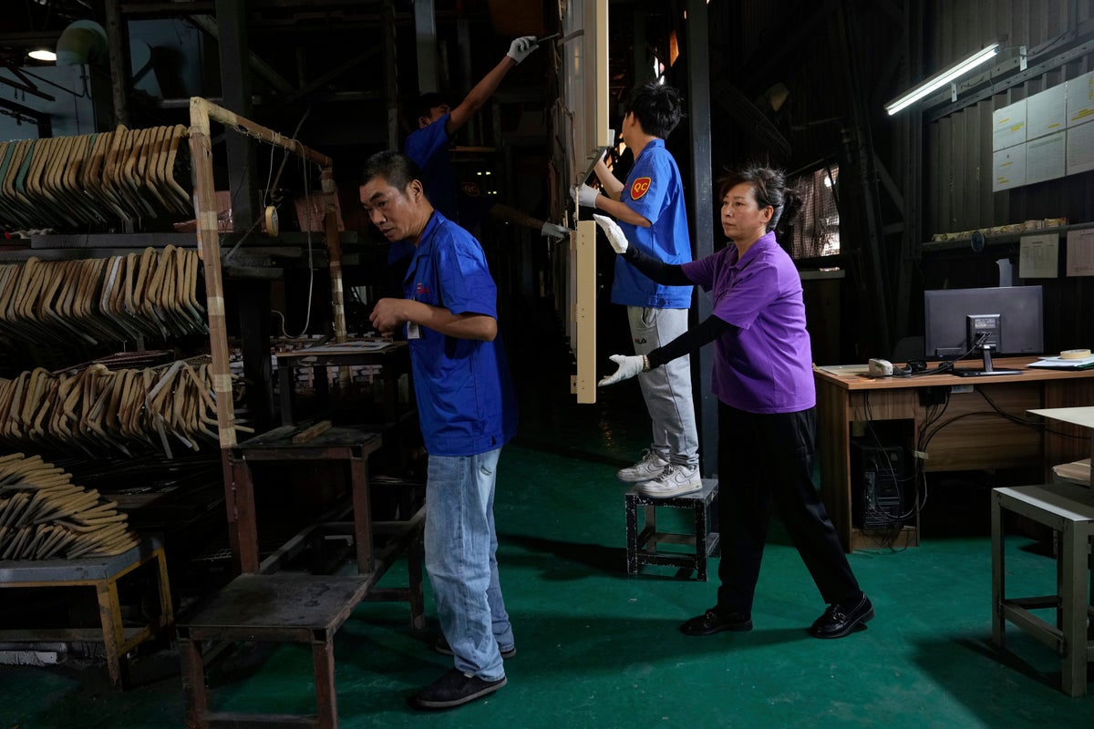 China's September factory PMI rises above 50, signalling expansion
