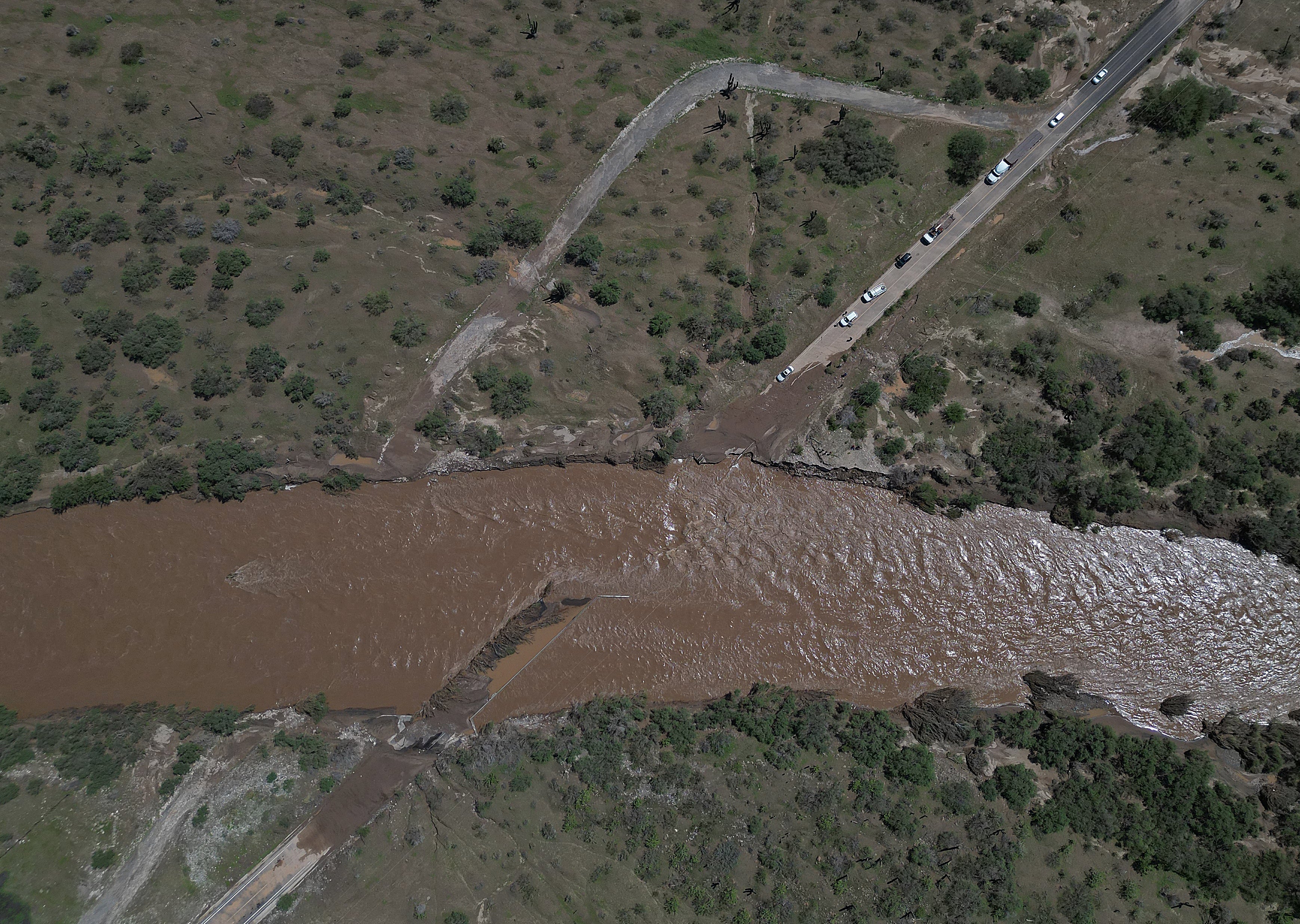 Aerial view of a road washed away after the arrival of Hurricane Polo near las Barrancas, Baja California Sur, Mexico.