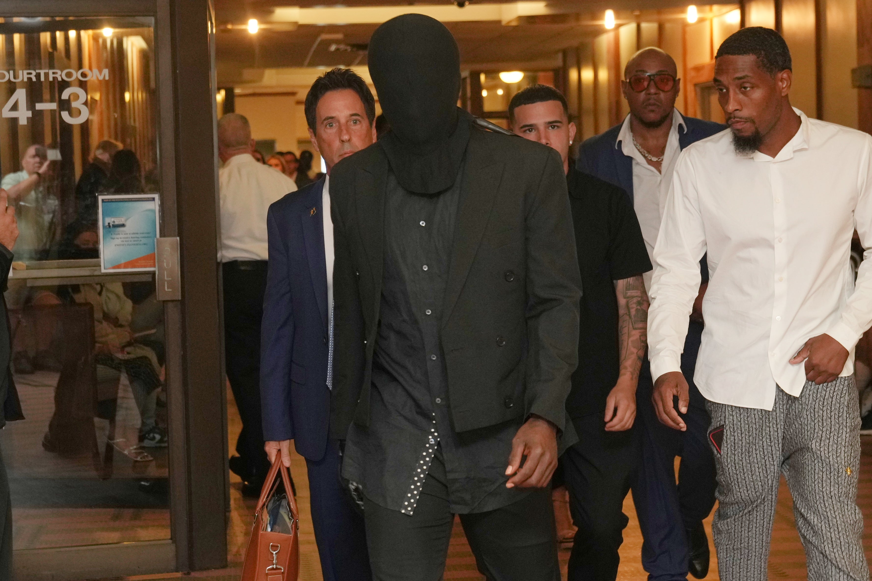 Antonio Brown shows up to court in unusual outfit before plea deal hearing is called off