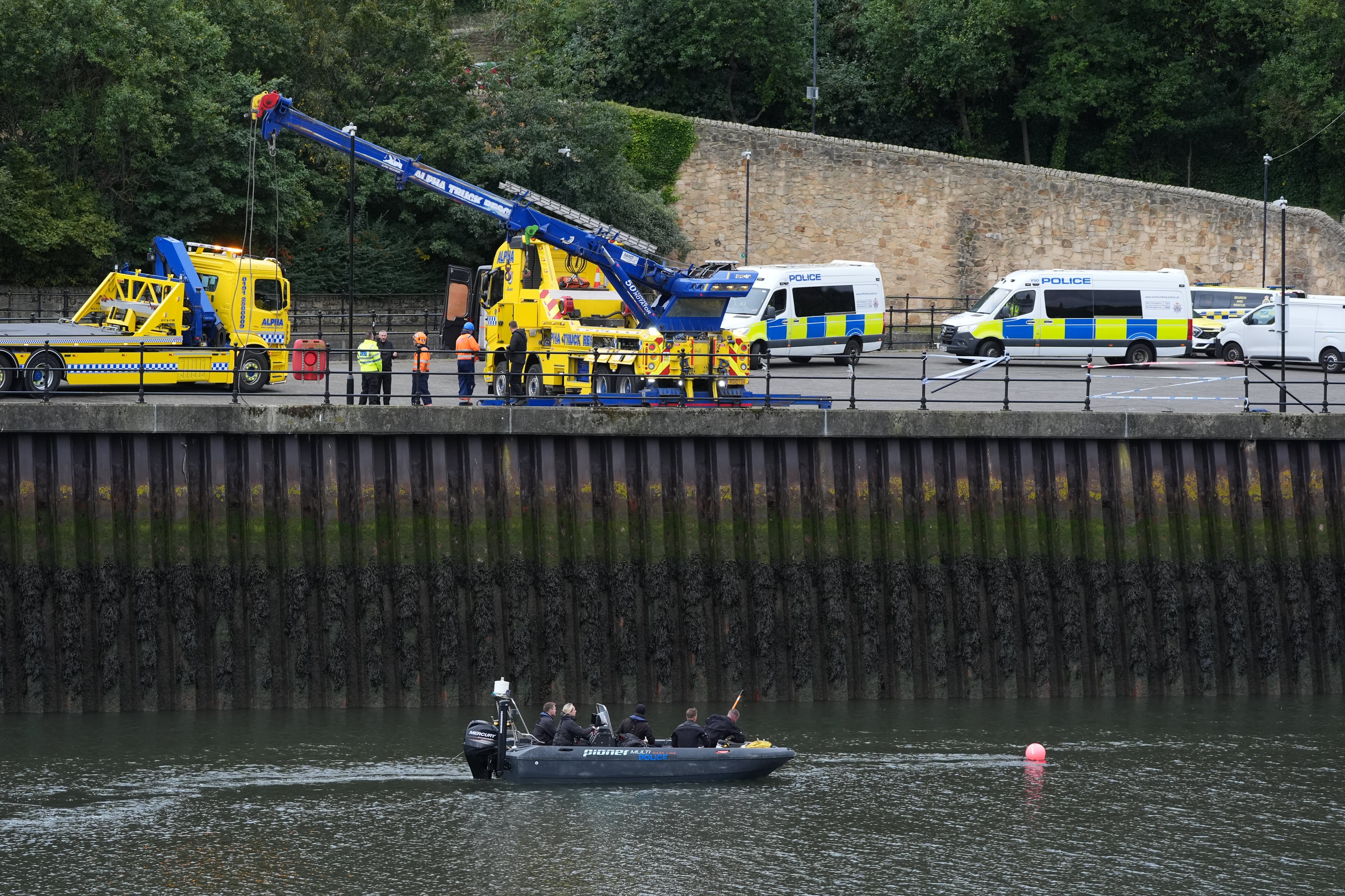Police divers at the scene on the River Wear in Sunderland (Owen Humphreys/PA) (PA Wire)