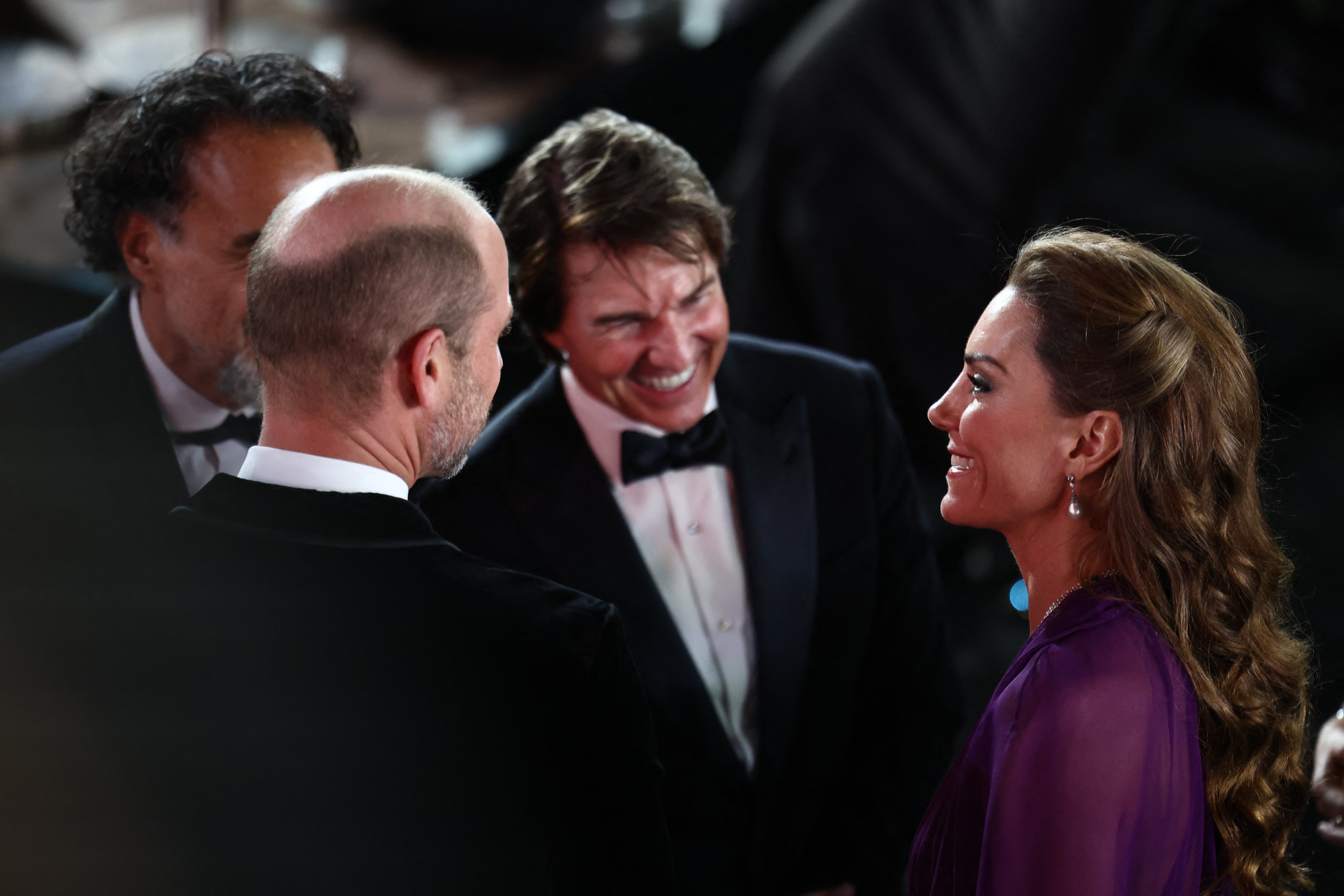 Tom Cruise was seen grinning from ear to ear while speaking to Kate at the 'Digger' world premiere (AFP/Getty)