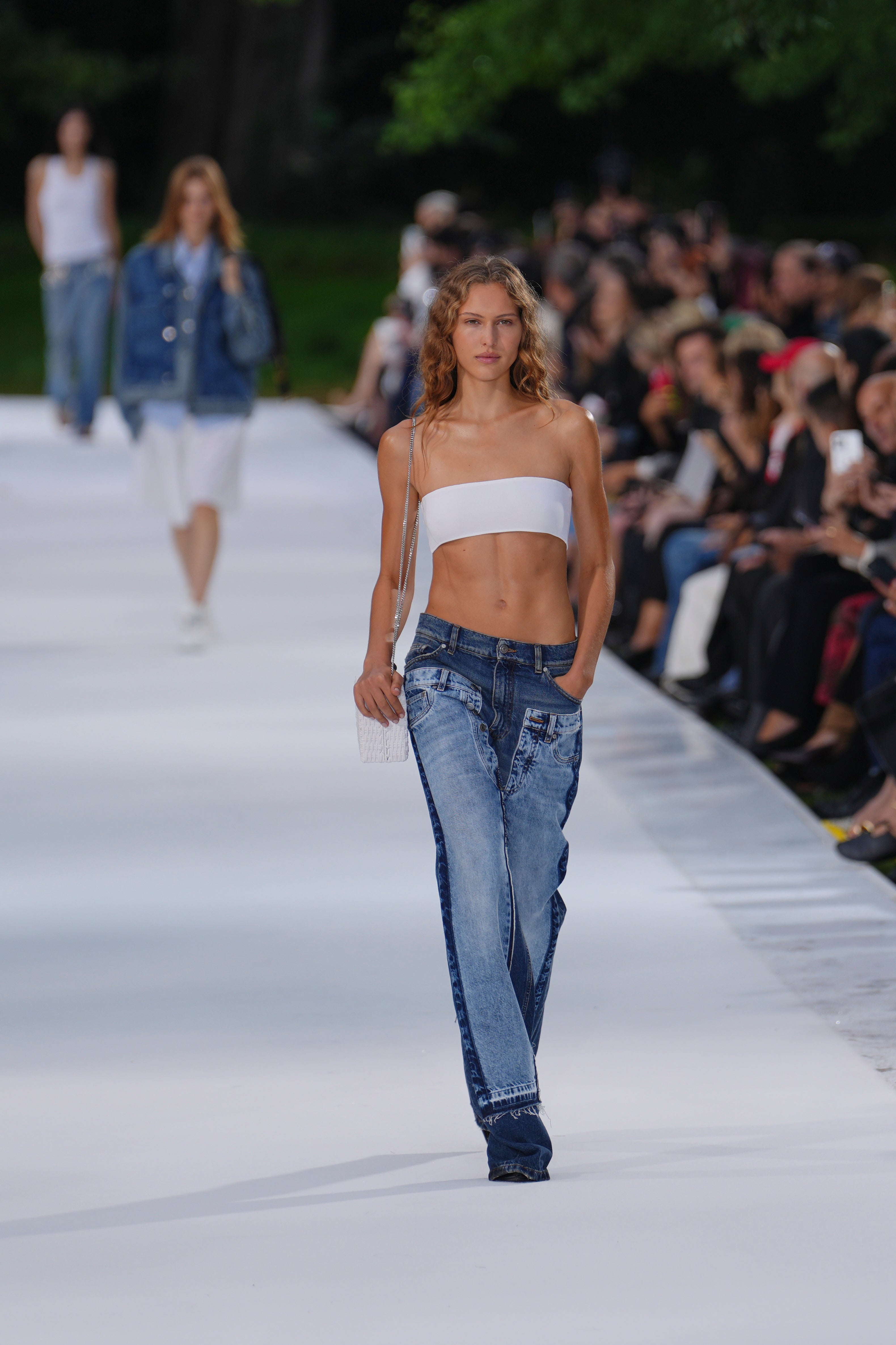Slim bandeaus were paired with low-rise jeans (Aurelien Morissard/AP) (AP)